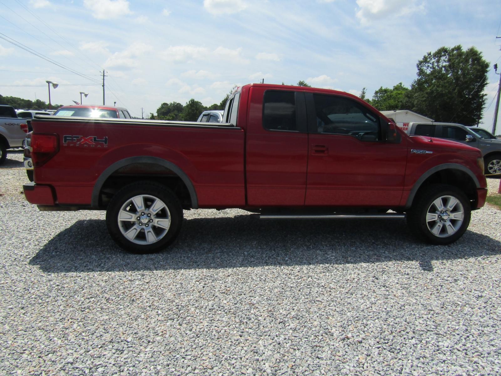 2010 Red Ford F-150 FX4 SuperCab 6.5-ft. Bed 4WD (1FTFX1EV3AK) with an 5.4L V8 SOHC 24V FFV engine, Automatic transmission, located at 15016 S Hwy 231, Midland City, AL, 36350, (334) 983-3001, 31.306210, -85.495277 - Photo #8