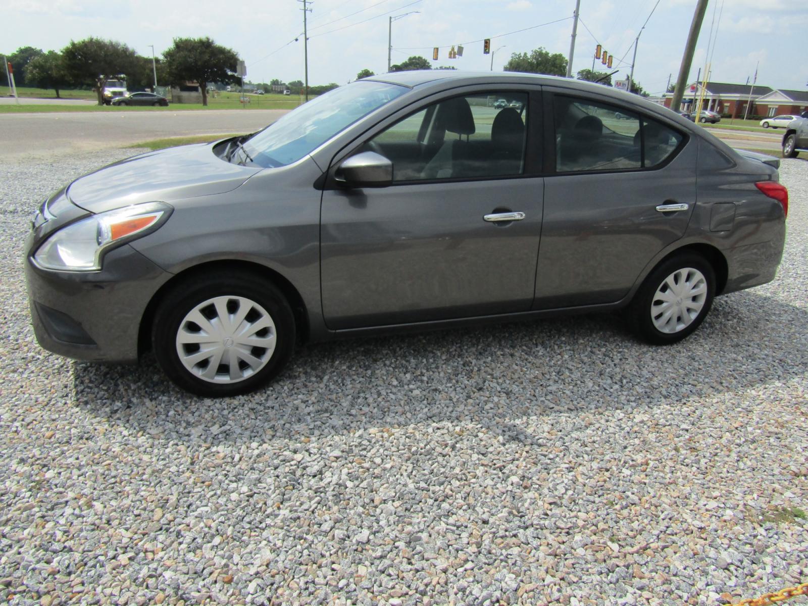 2016 Gray /Gray Nissan Versa 1.6 S 5M (3N1CN7AP6GL) with an 1.6L L4 DOHC 16V engine, Automatic transmission, located at 15016 S Hwy 231, Midland City, AL, 36350, (334) 983-3001, 31.306210, -85.495277 - Photo #2