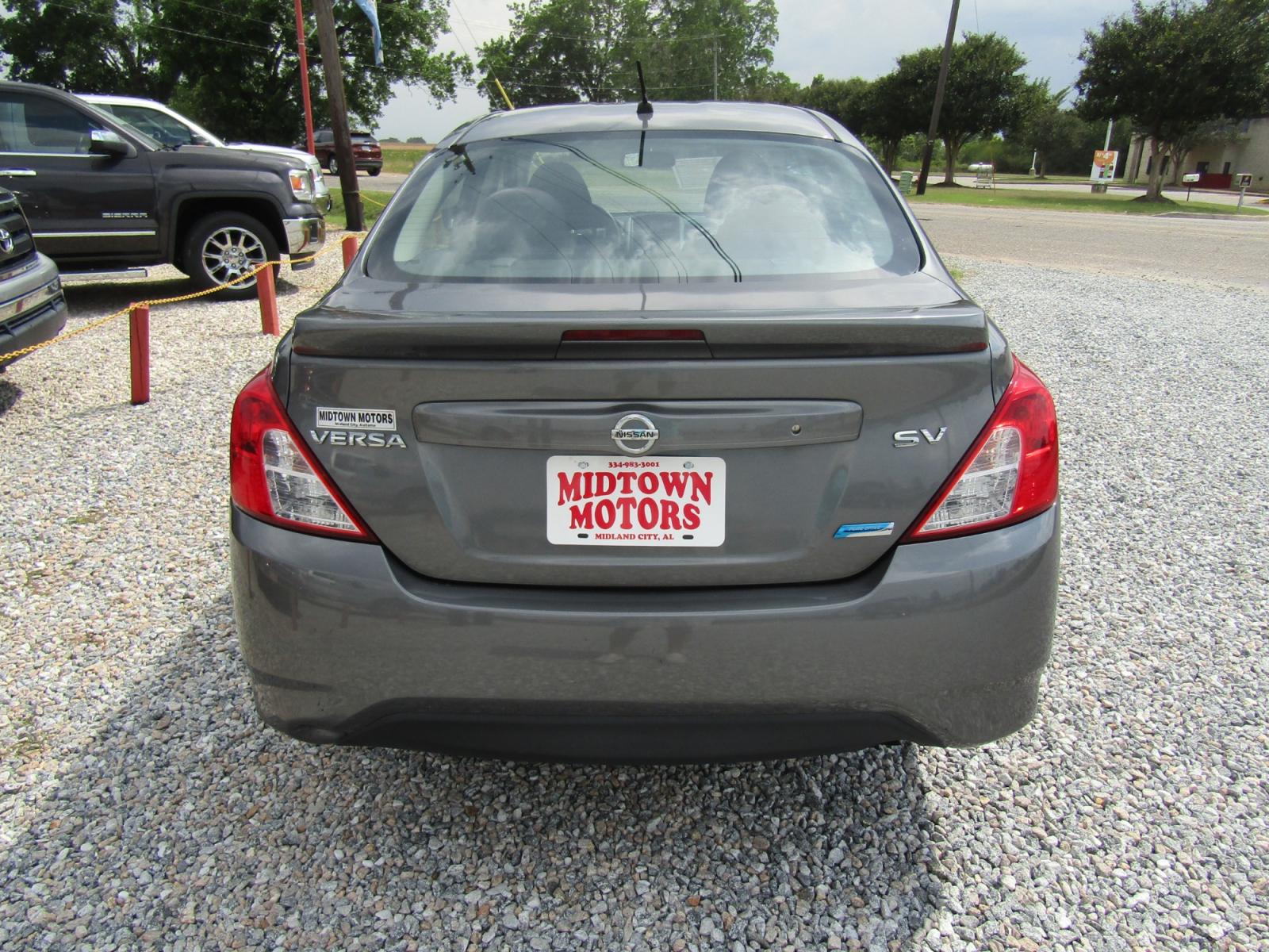 2016 Gray /Gray Nissan Versa 1.6 S 5M (3N1CN7AP6GL) with an 1.6L L4 DOHC 16V engine, Automatic transmission, located at 15016 S Hwy 231, Midland City, AL, 36350, (334) 983-3001, 31.306210, -85.495277 - Photo #6