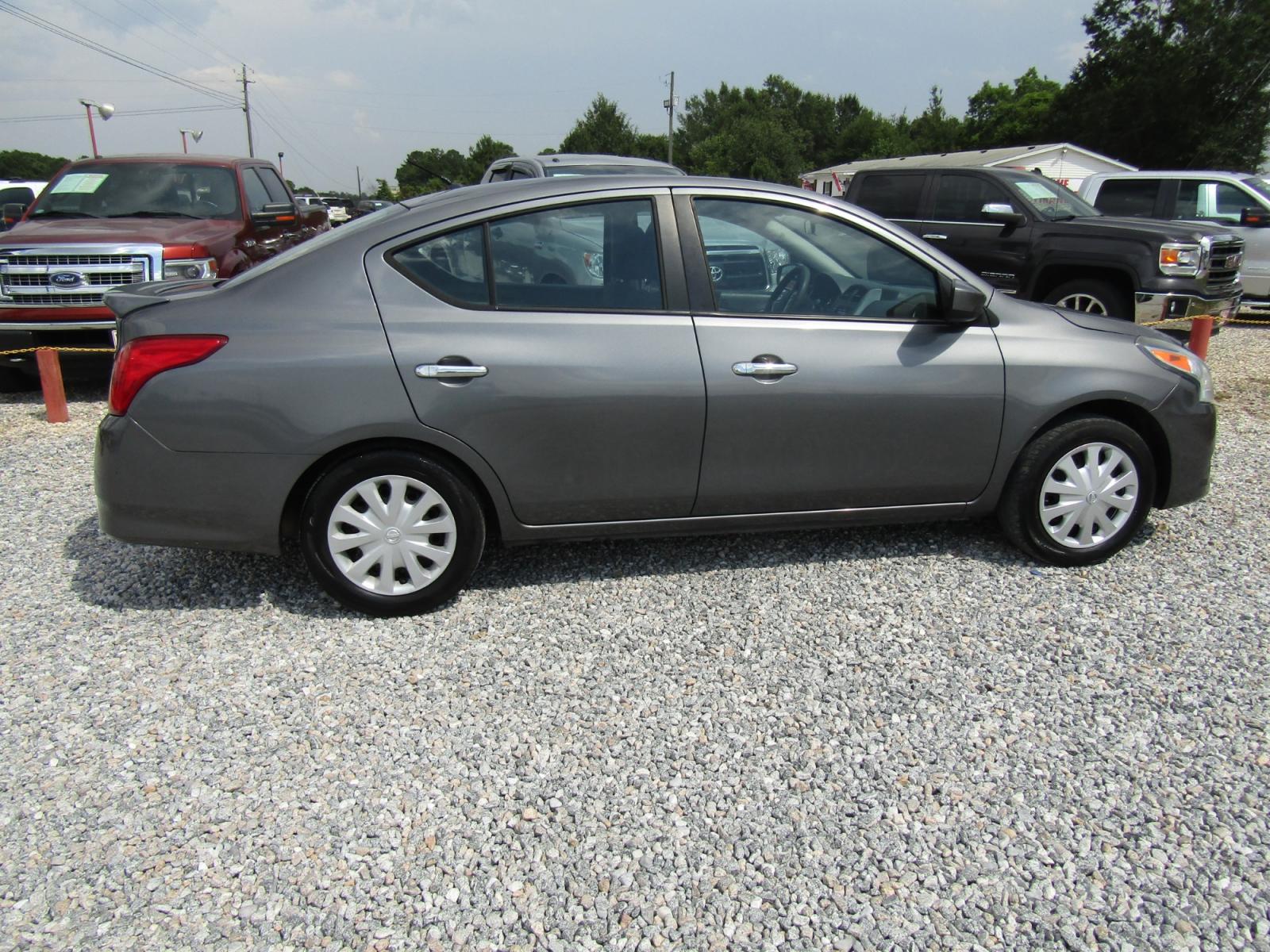 2016 Gray /Gray Nissan Versa 1.6 S 5M (3N1CN7AP6GL) with an 1.6L L4 DOHC 16V engine, Automatic transmission, located at 15016 S Hwy 231, Midland City, AL, 36350, (334) 983-3001, 31.306210, -85.495277 - Photo #7