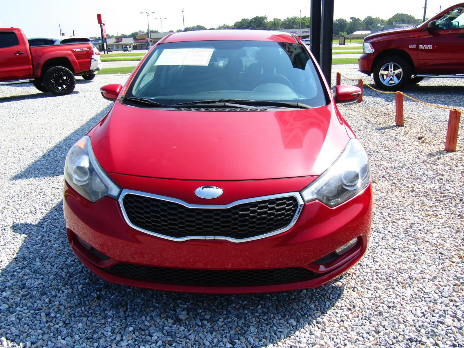2014 Red Kia Forte EX (KNAFX4A80E5) with an 2.0L L4 DOHC 16V engine, Automatic transmission, located at 15016 S Hwy 231, Midland City, AL, 36350, (334) 983-3001, 31.306210, -85.495277 - Photo #1