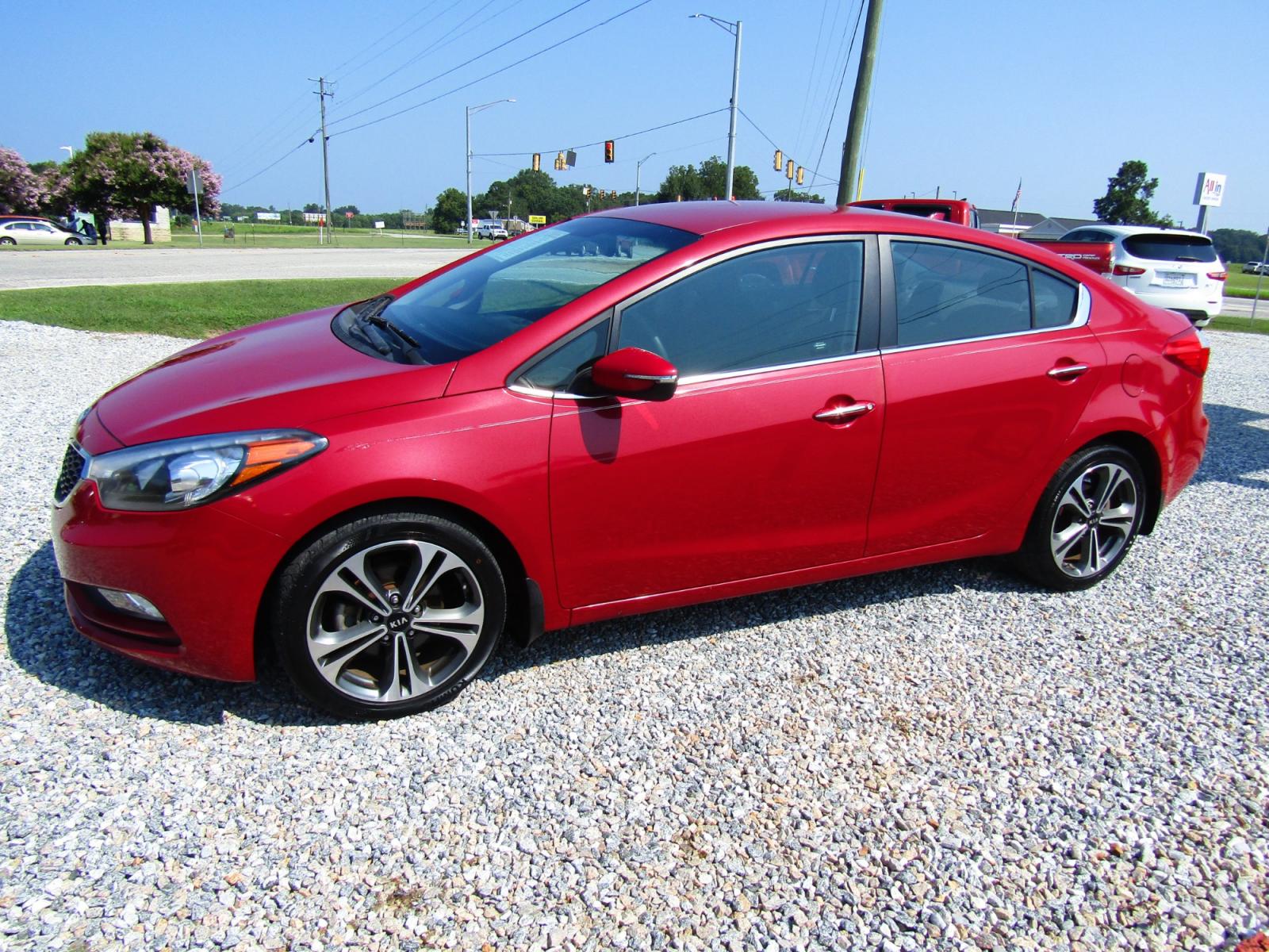 2014 Red Kia Forte EX (KNAFX4A80E5) with an 2.0L L4 DOHC 16V engine, Automatic transmission, located at 15016 S Hwy 231, Midland City, AL, 36350, (334) 983-3001, 31.306210, -85.495277 - Photo #2