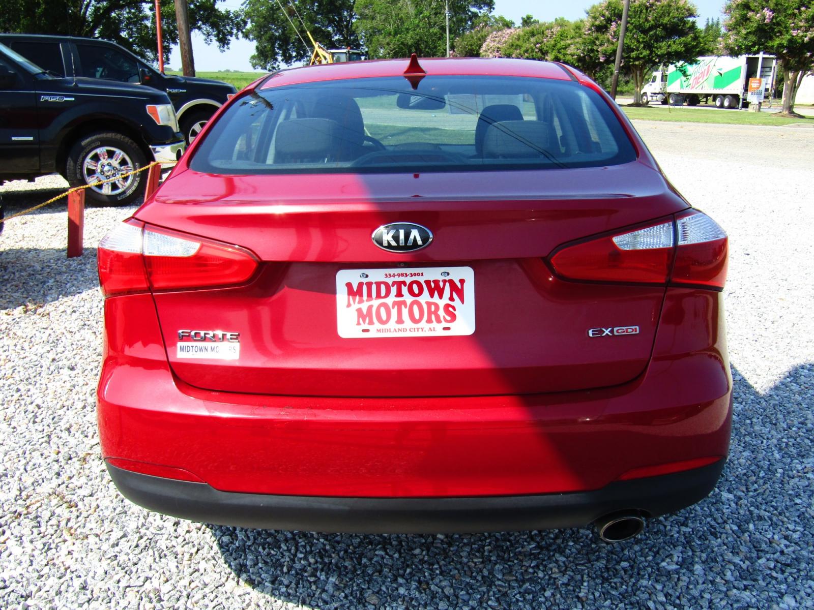 2014 Red Kia Forte EX (KNAFX4A80E5) with an 2.0L L4 DOHC 16V engine, Automatic transmission, located at 15016 S Hwy 231, Midland City, AL, 36350, (334) 983-3001, 31.306210, -85.495277 - Photo #6