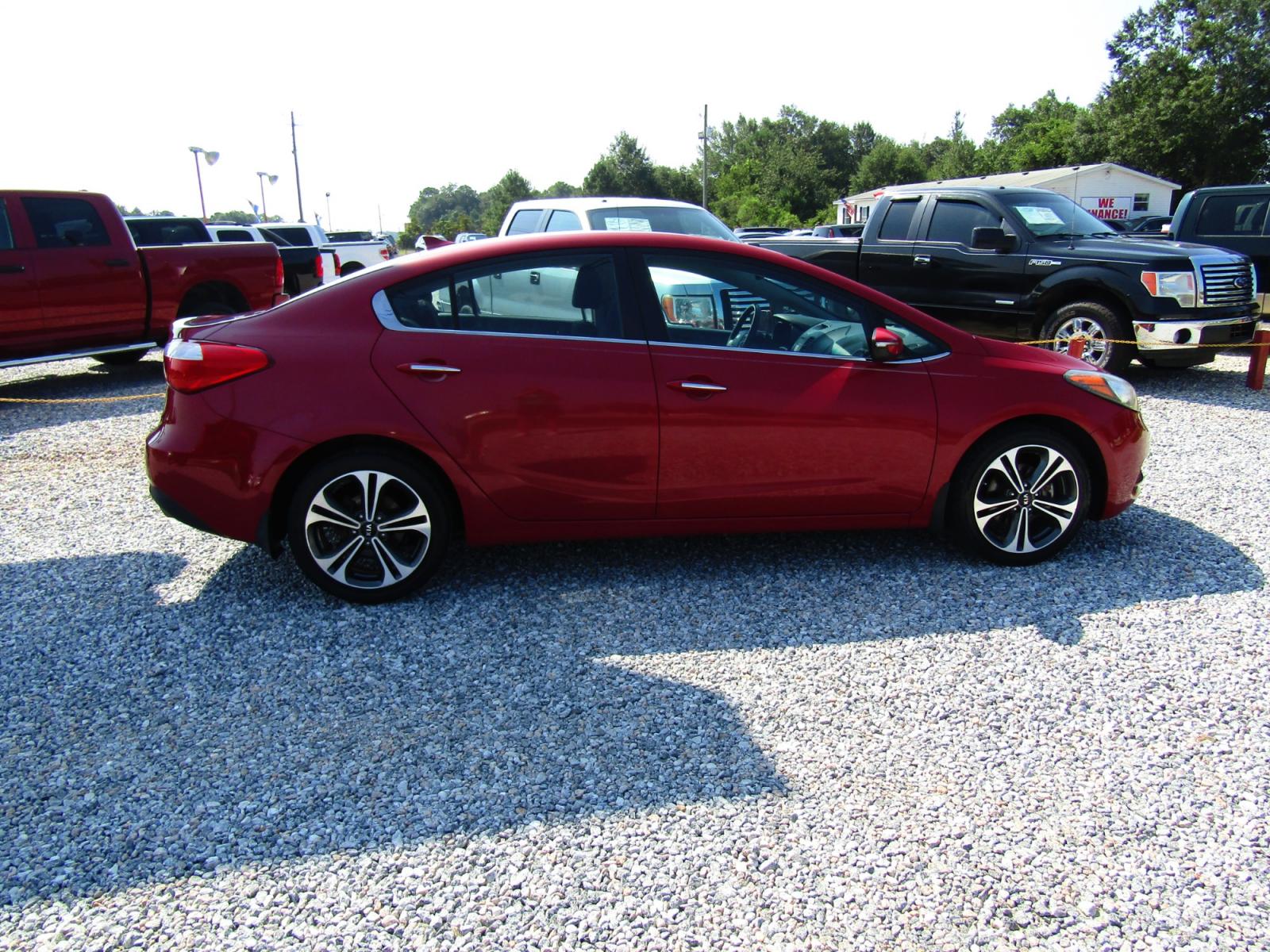 2014 Red Kia Forte EX (KNAFX4A80E5) with an 2.0L L4 DOHC 16V engine, Automatic transmission, located at 15016 S Hwy 231, Midland City, AL, 36350, (334) 983-3001, 31.306210, -85.495277 - Photo #7