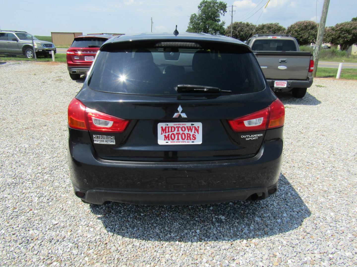 2013 Black /Black Mitsubishi Outlander Sport ES 2WD (4A4AP3AU2DE) with an 2.0L L4 DOHC 16V engine, Automatic transmission, located at 15016 S Hwy 231, Midland City, AL, 36350, (334) 983-3001, 31.306210, -85.495277- Photo#6