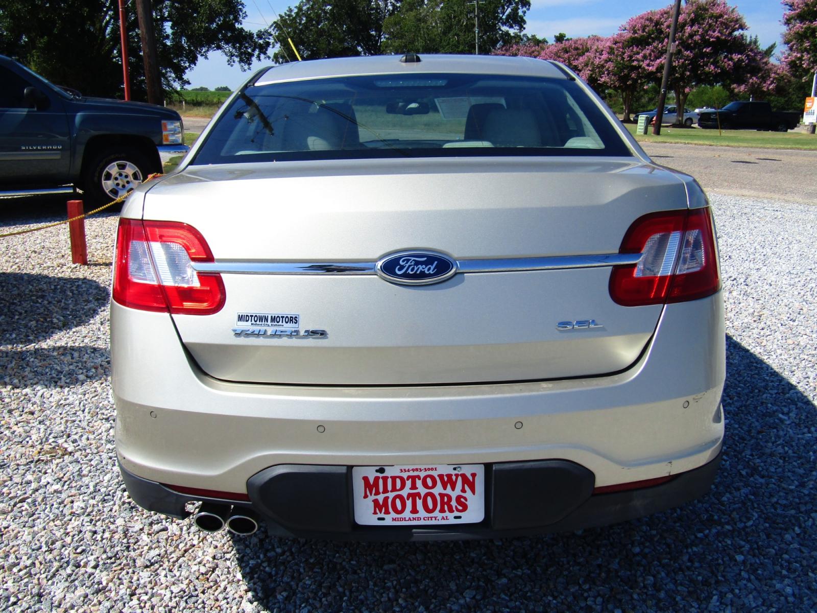 2011 Gold /Tan Ford Taurus SEL FWD (1FAHP2EW4BG) with an 3.5L V6 DOHC 24V engine, Automatic transmission, located at 15016 S Hwy 231, Midland City, AL, 36350, (334) 983-3001, 31.306210, -85.495277 - Photo #6