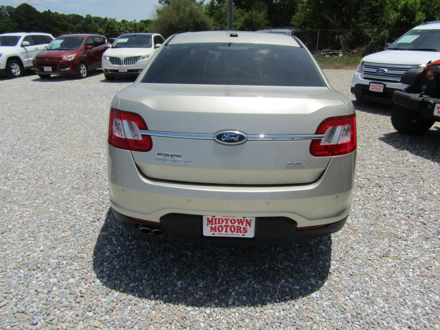 2011 Gold /Tan Ford Taurus SEL FWD (1FAHP2EW4BG) with an 3.5L V6 DOHC 24V engine, Automatic transmission, located at 15016 S Hwy 231, Midland City, AL, 36350, (334) 983-3001, 31.306210, -85.495277 - Photo#5