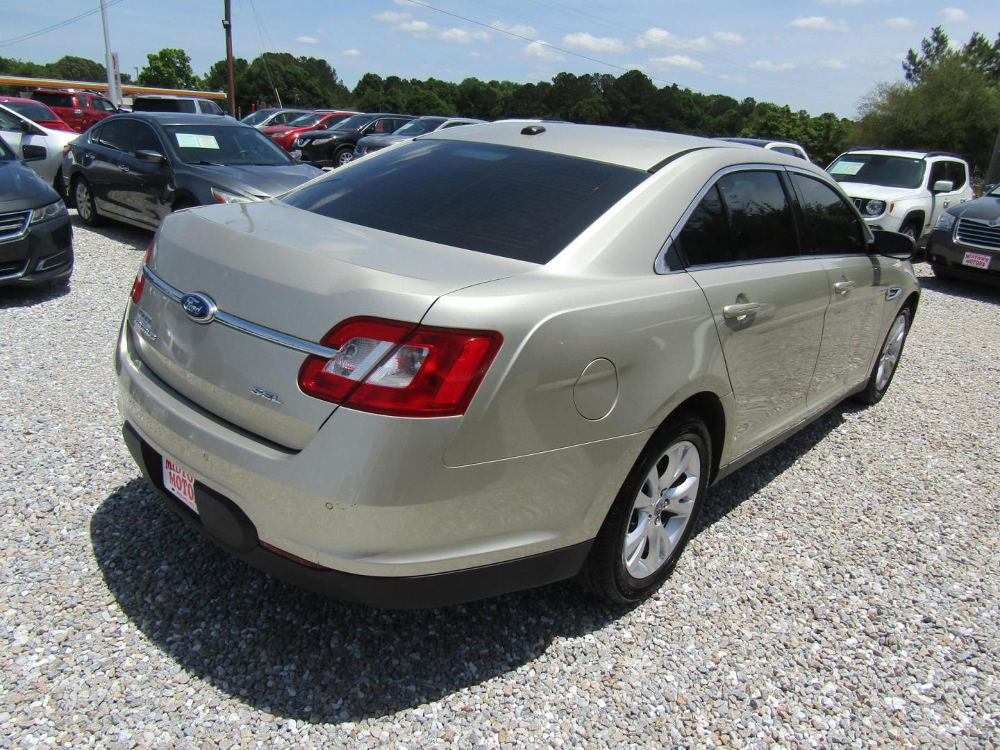 2011 Gold /Tan Ford Taurus SEL FWD (1FAHP2EW4BG) with an 3.5L V6 DOHC 24V engine, Automatic transmission, located at 15016 S Hwy 231, Midland City, AL, 36350, (334) 983-3001, 31.306210, -85.495277 - Photo#6