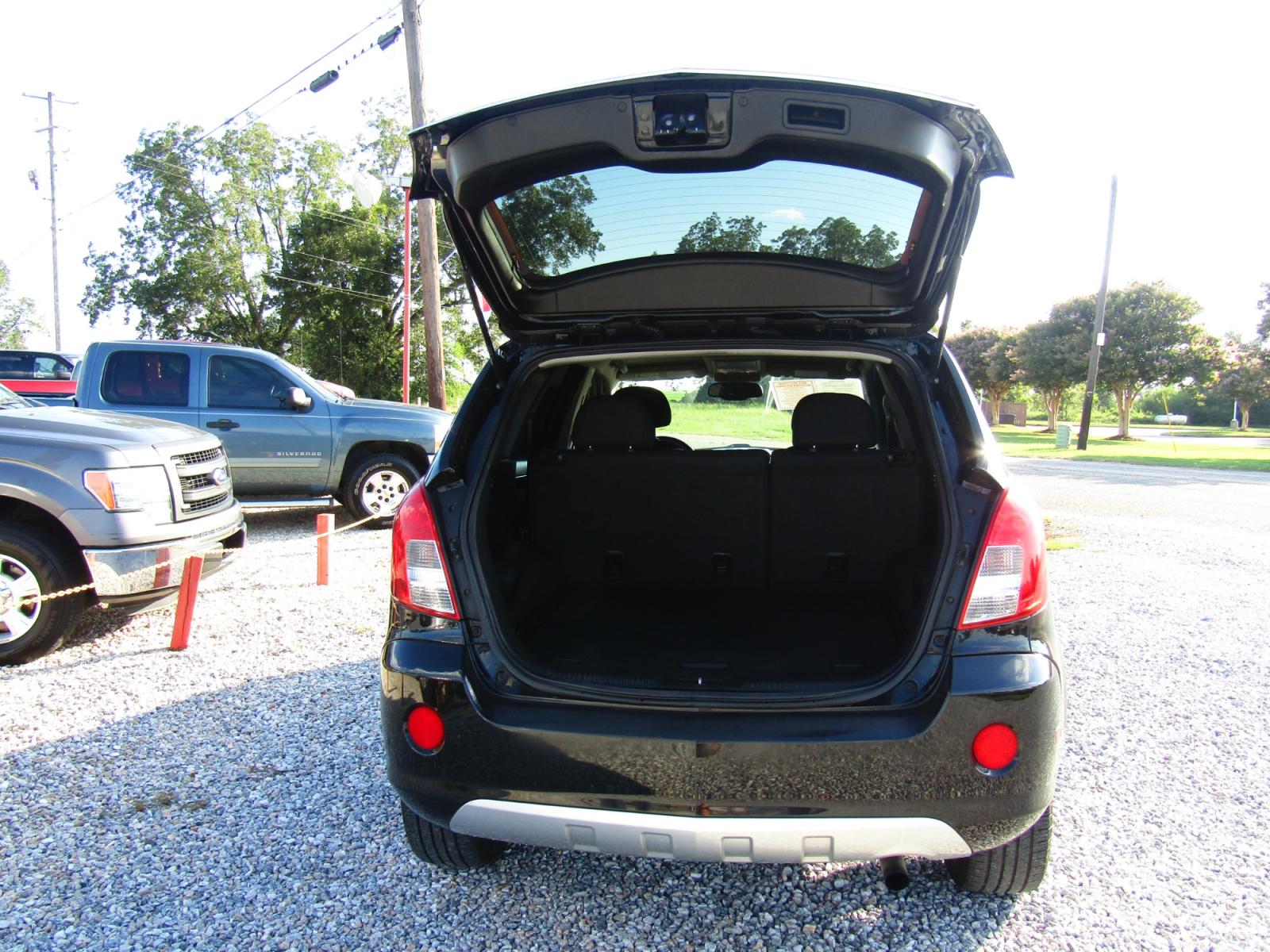 2015 Black Chevrolet Captiva Sport 1LT FWD (3GNAL3EK8FS) with an 2.4L L4 DOHC 16V FFV engine, Automatic transmission, located at 15016 S Hwy 231, Midland City, AL, 36350, (334) 983-3001, 31.306210, -85.495277 - Photo #7