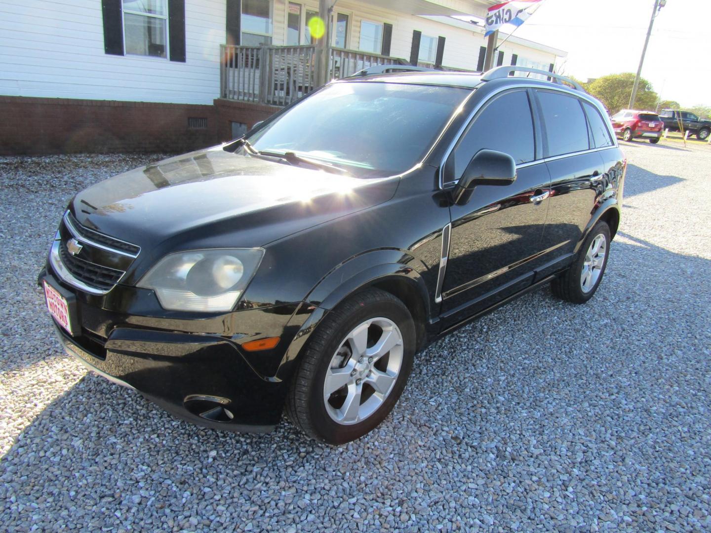 2015 Black Chevrolet Captiva Sport 1LT FWD (3GNAL3EK8FS) with an 2.4L L4 DOHC 16V FFV engine, Automatic transmission, located at 15016 S Hwy 231, Midland City, AL, 36350, (334) 983-3001, 31.306210, -85.495277 - Photo#2