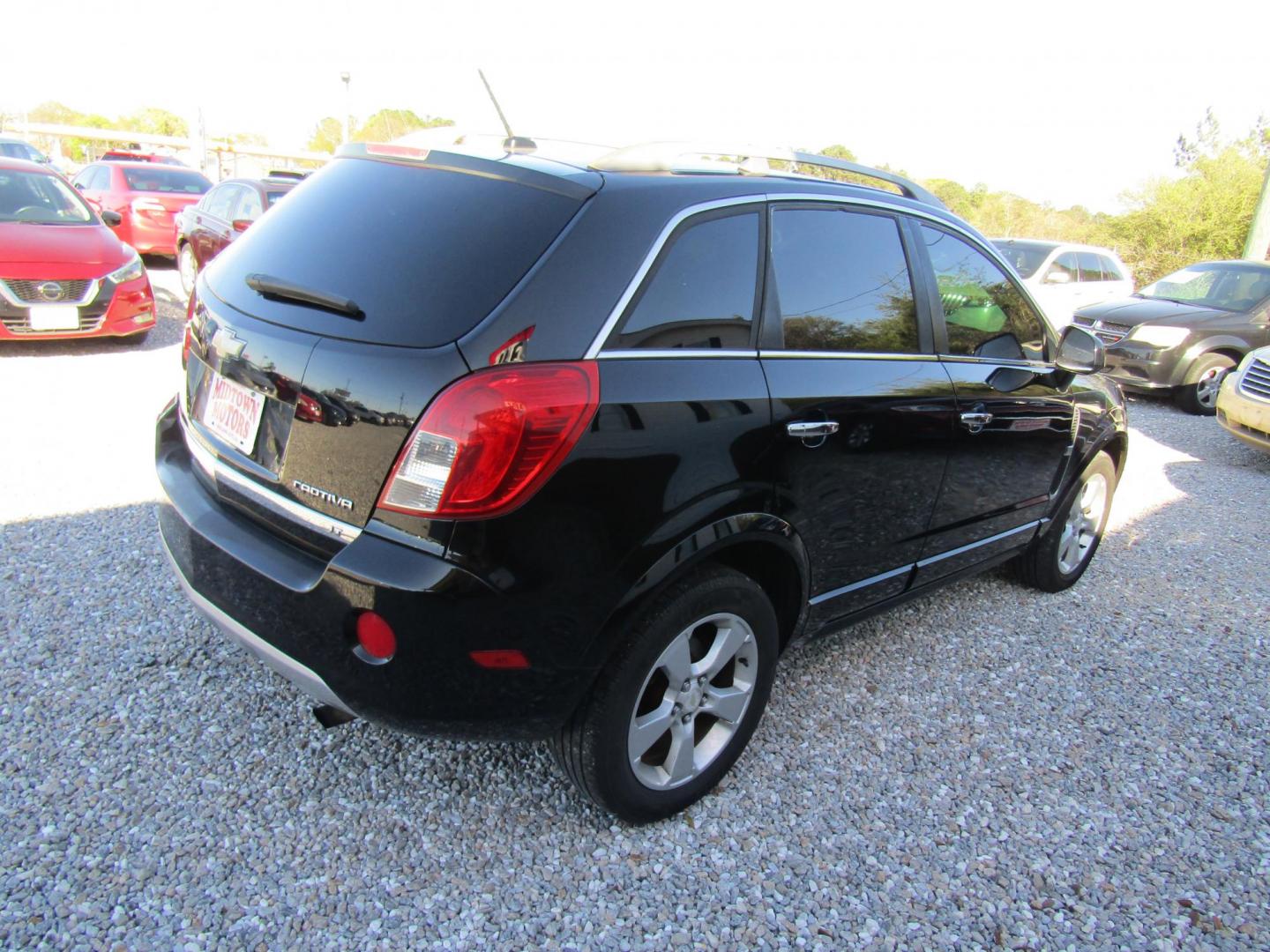 2015 Black Chevrolet Captiva Sport 1LT FWD (3GNAL3EK8FS) with an 2.4L L4 DOHC 16V FFV engine, Automatic transmission, located at 15016 S Hwy 231, Midland City, AL, 36350, (334) 983-3001, 31.306210, -85.495277 - Photo#5