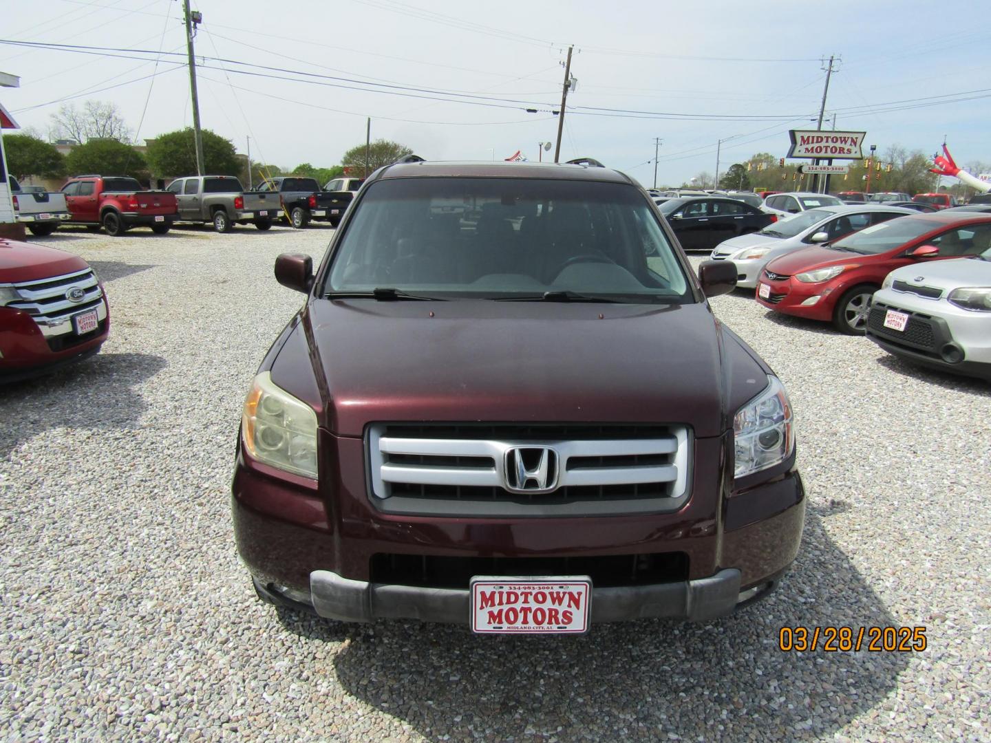 2007 Maroon /Gray Honda Pilot EX-L 2WD w/ DVD (5FNYF28667B) with an 3.5L V6 SOHC 24V engine, Automatic transmission, located at 15016 S Hwy 231, Midland City, AL, 36350, (334) 983-3001, 31.306210, -85.495277 - Photo#1