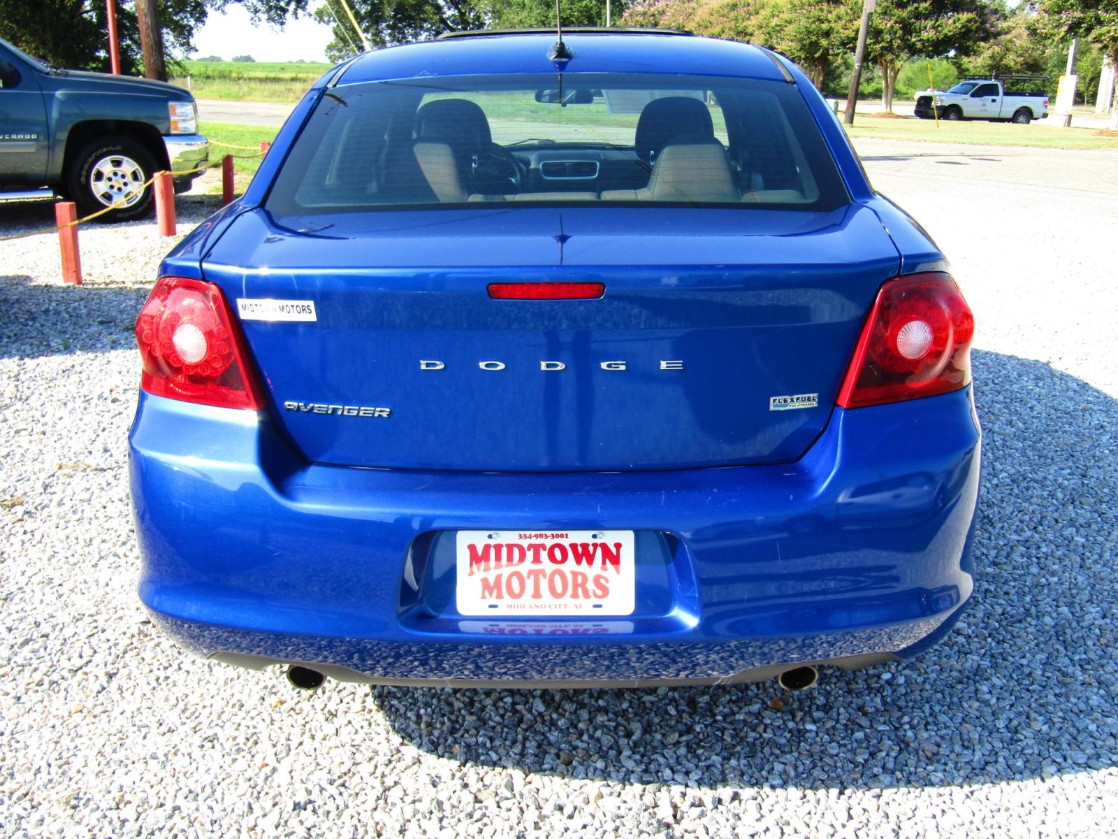 2013 Blue Dodge Avenger SXT (1C3CDZCG6DN) with an 3.6L V6 DOHC 24V FFV engine, Automatic transmission, located at 15016 S Hwy 231, Midland City, AL, 36350, (334) 983-3001, 31.306210, -85.495277 - Photo #6