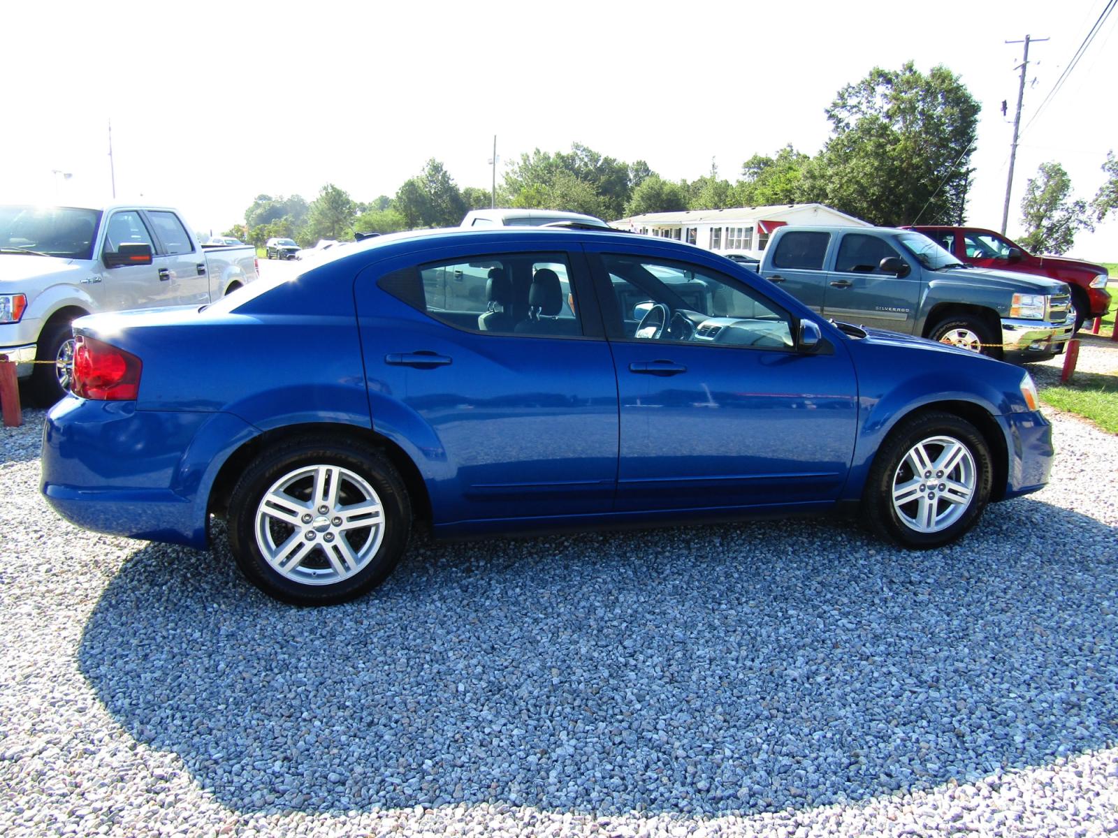 2013 Blue Dodge Avenger SXT (1C3CDZCG6DN) with an 3.6L V6 DOHC 24V FFV engine, Automatic transmission, located at 15016 S Hwy 231, Midland City, AL, 36350, (334) 983-3001, 31.306210, -85.495277 - Photo #7