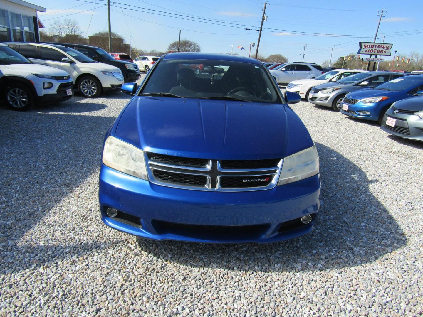 2013 Blue Dodge Avenger SXT (1C3CDZCG6DN) with an 3.6L V6 DOHC 24V FFV engine, Automatic transmission, located at 15016 S Hwy 231, Midland City, AL, 36350, (334) 983-3001, 31.306210, -85.495277 - Photo#1