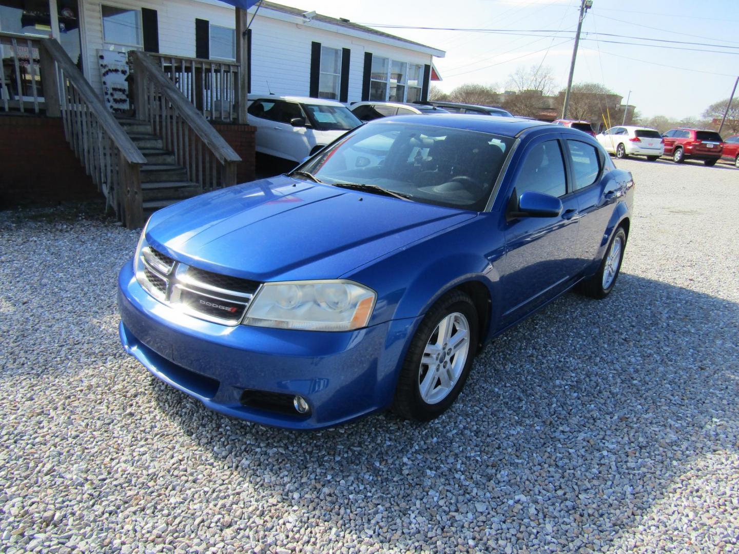 2013 Blue Dodge Avenger SXT (1C3CDZCG6DN) with an 3.6L V6 DOHC 24V FFV engine, Automatic transmission, located at 15016 S Hwy 231, Midland City, AL, 36350, (334) 983-3001, 31.306210, -85.495277 - Photo#2