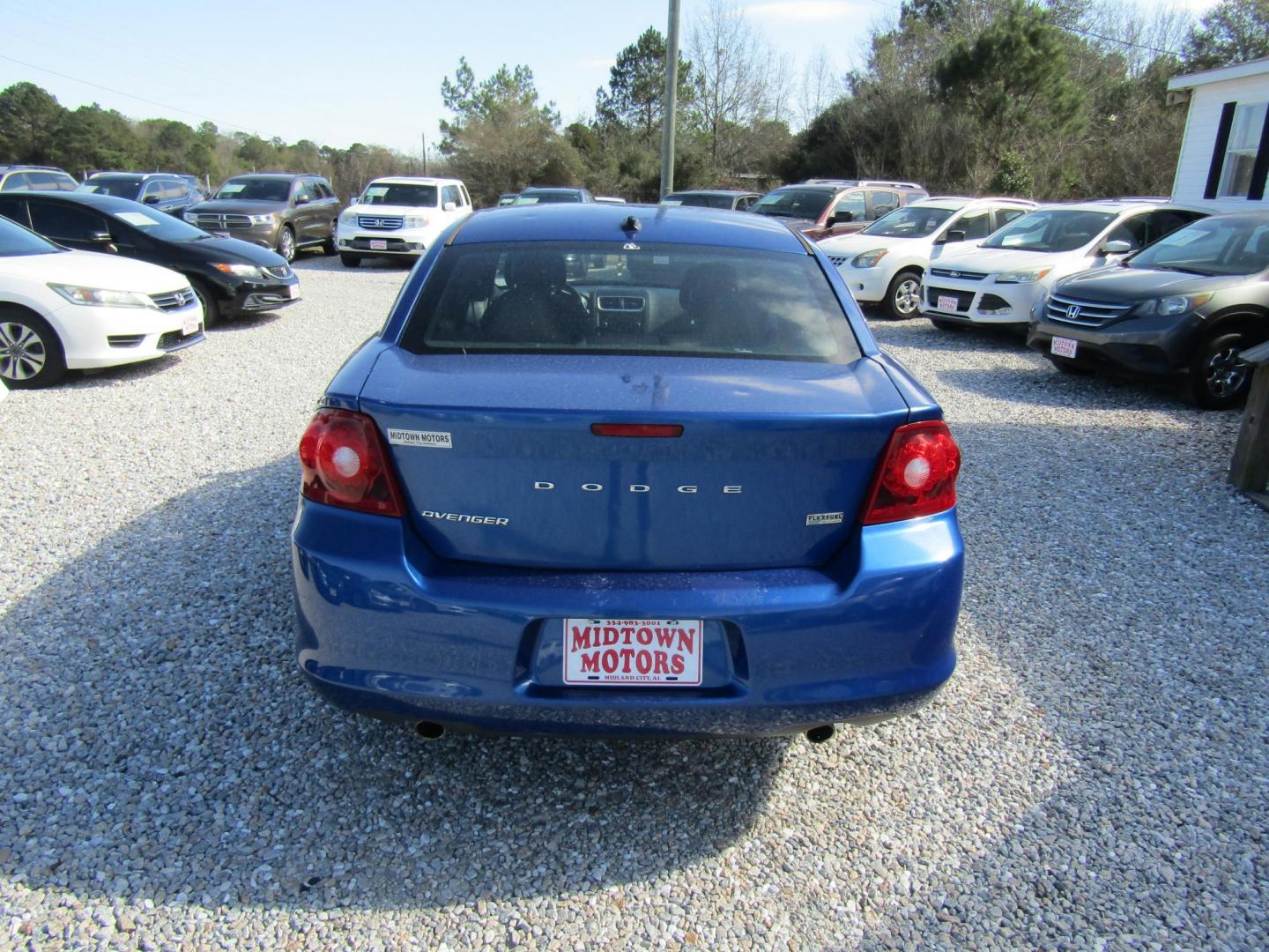 2013 Blue Dodge Avenger SXT (1C3CDZCG6DN) with an 3.6L V6 DOHC 24V FFV engine, Automatic transmission, located at 15016 S Hwy 231, Midland City, AL, 36350, (334) 983-3001, 31.306210, -85.495277 - Photo#6