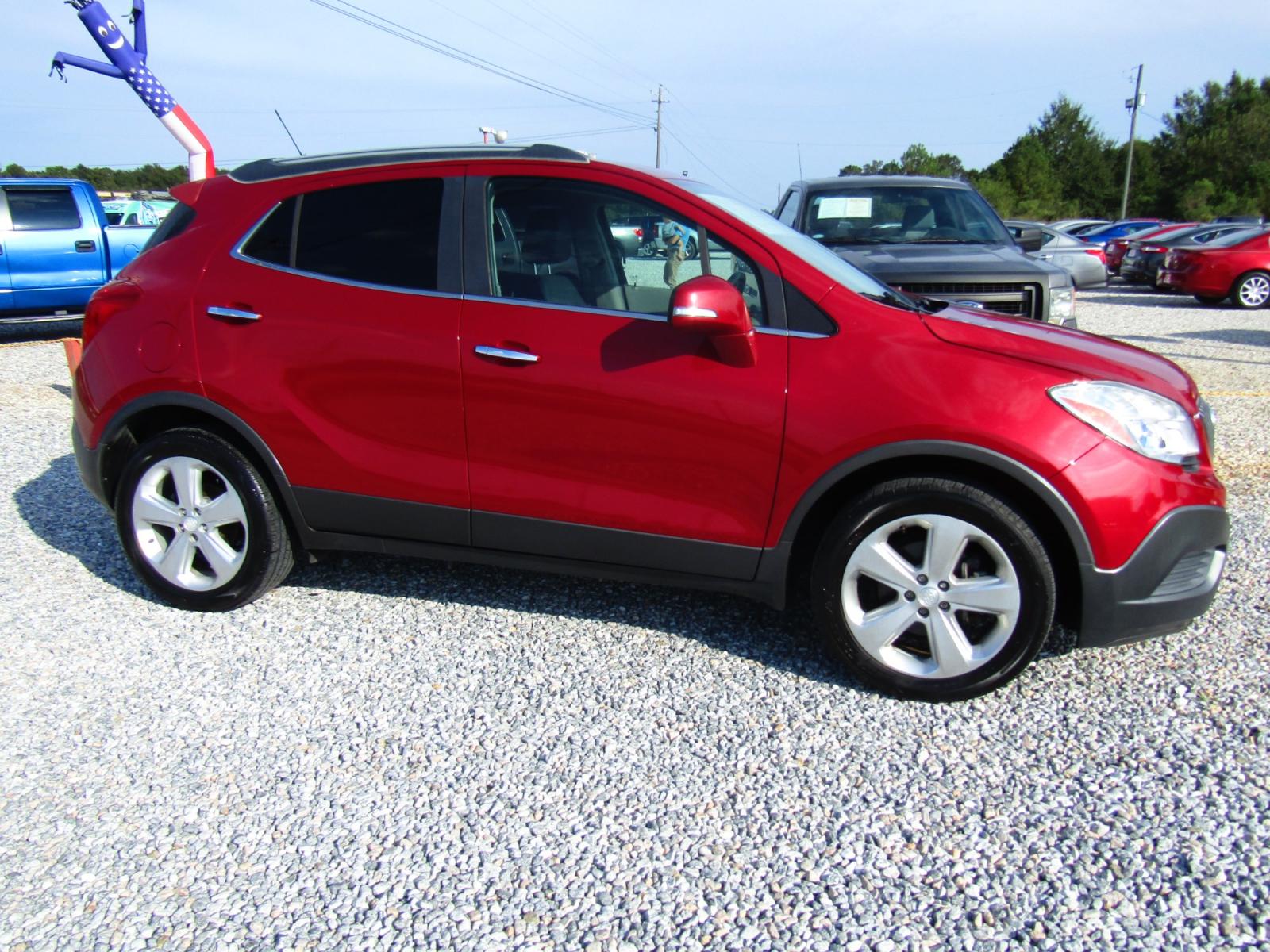 2015 Red Buick Encore Base FWD (KL4CJASB9FB) with an 1.4L L4 DOHC 16V TURBO engine, Automatic transmission, located at 15016 S Hwy 231, Midland City, AL, 36350, (334) 983-3001, 31.306210, -85.495277 - Photo #0