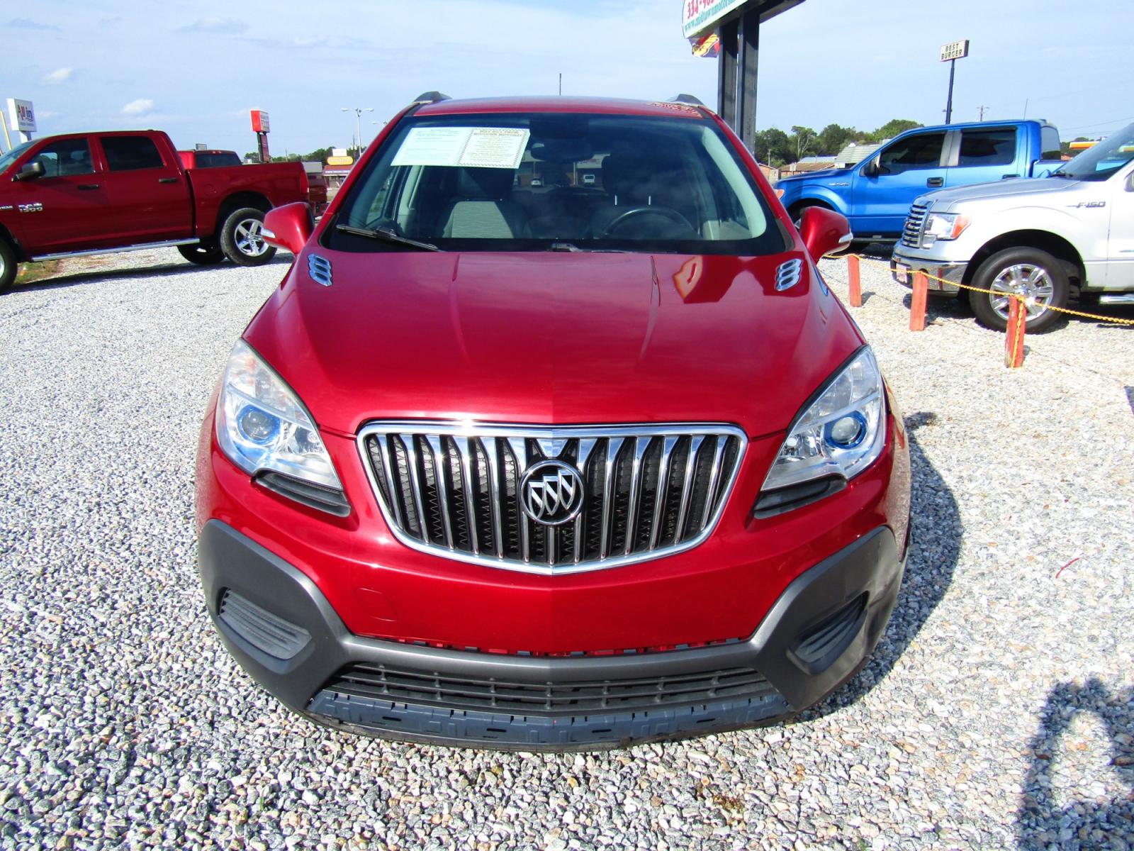 2015 Red Buick Encore Base FWD (KL4CJASB9FB) with an 1.4L L4 DOHC 16V TURBO engine, Automatic transmission, located at 15016 S Hwy 231, Midland City, AL, 36350, (334) 983-3001, 31.306210, -85.495277 - Photo #1