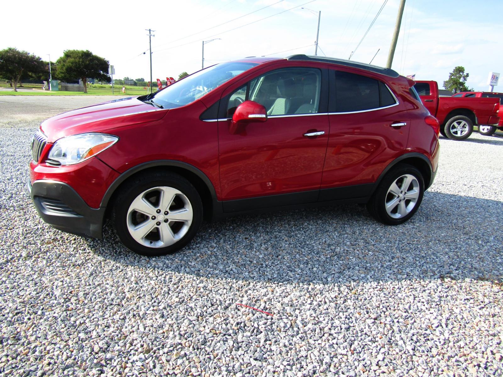 2015 Red Buick Encore Base FWD (KL4CJASB9FB) with an 1.4L L4 DOHC 16V TURBO engine, Automatic transmission, located at 15016 S Hwy 231, Midland City, AL, 36350, (334) 983-3001, 31.306210, -85.495277 - Photo #2