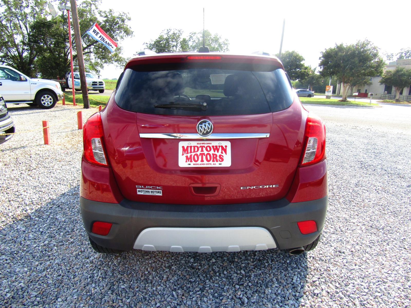 2015 Red Buick Encore Base FWD (KL4CJASB9FB) with an 1.4L L4 DOHC 16V TURBO engine, Automatic transmission, located at 15016 S Hwy 231, Midland City, AL, 36350, (334) 983-3001, 31.306210, -85.495277 - Photo #6