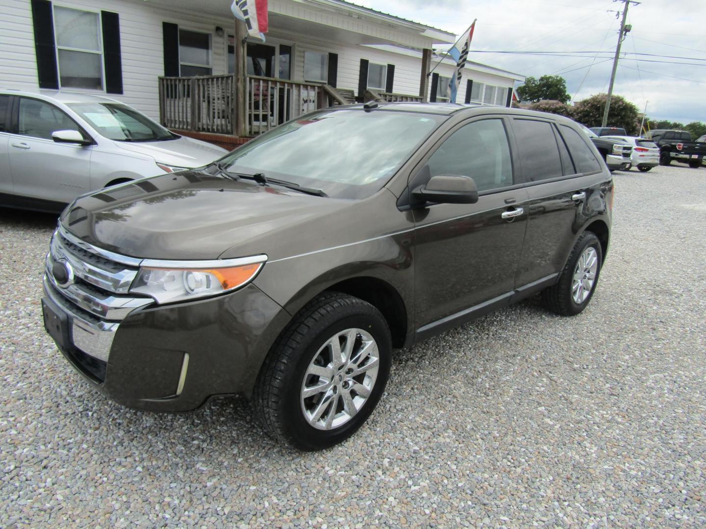 2011 Brown /Tan Ford Edge SEL FWD (2FMDK3JC5BB) with an 3.5L V6 DOHC 24V engine, Automatic transmission, located at 15016 S Hwy 231, Midland City, AL, 36350, (334) 983-3001, 31.306210, -85.495277 - Photo#2