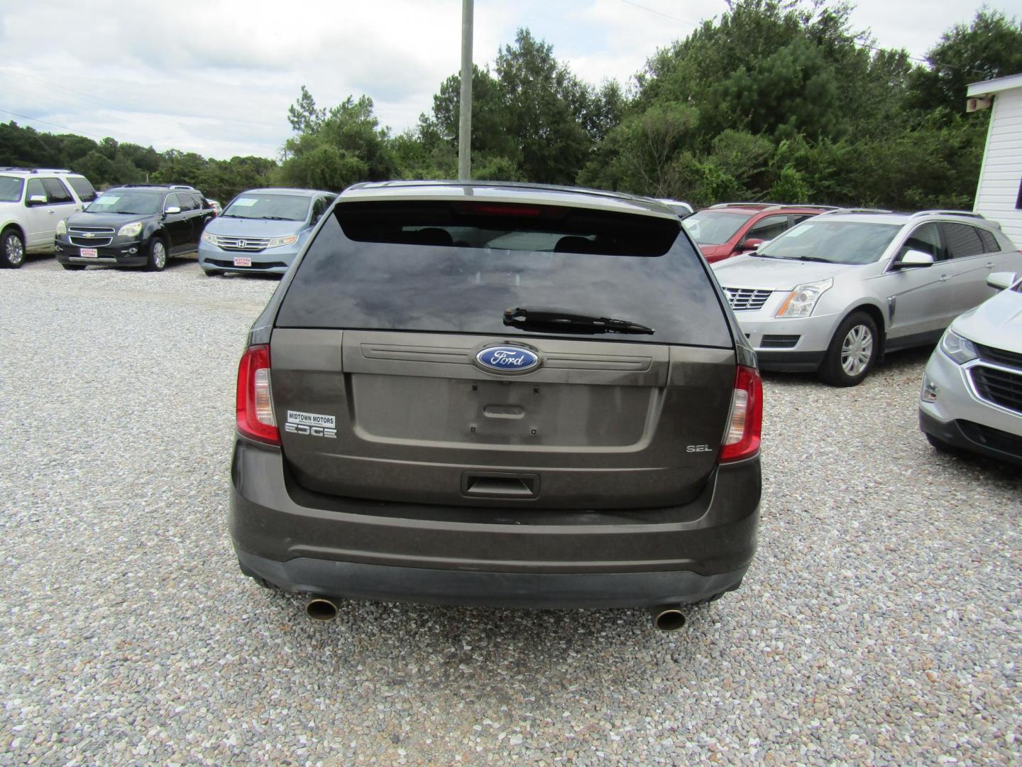 2011 Brown /Tan Ford Edge SEL FWD (2FMDK3JC5BB) with an 3.5L V6 DOHC 24V engine, Automatic transmission, located at 15016 S Hwy 231, Midland City, AL, 36350, (334) 983-3001, 31.306210, -85.495277 - Photo#6