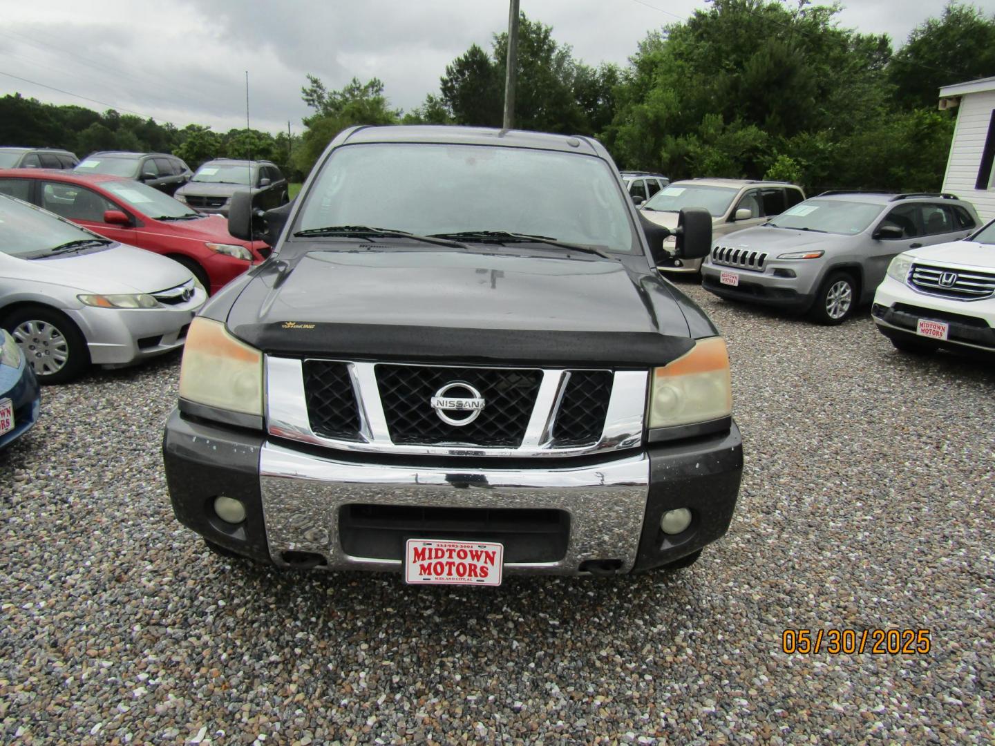 2010 Gray Nissan Titan LE Crew Cab 2WD SWB (1N6AA0ED4AN) with an 5.6L V8 DOHC 32V engine, Automatic transmission, located at 15016 S Hwy 231, Midland City, AL, 36350, (334) 983-3001, 31.306210, -85.495277 - Photo#1
