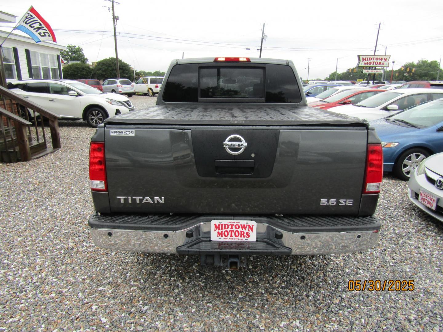 2010 Gray Nissan Titan LE Crew Cab 2WD SWB (1N6AA0ED4AN) with an 5.6L V8 DOHC 32V engine, Automatic transmission, located at 15016 S Hwy 231, Midland City, AL, 36350, (334) 983-3001, 31.306210, -85.495277 - Photo#6