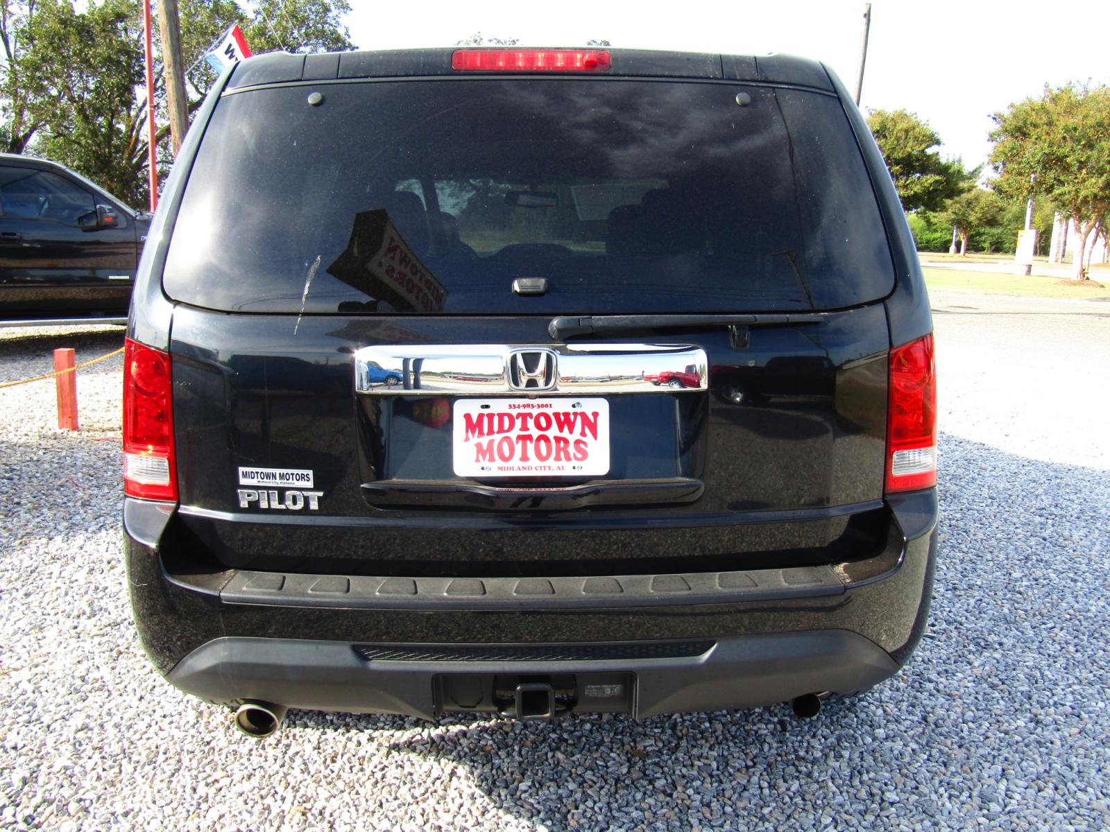 2013 Black /Gray Honda Pilot EX-L 2WD 5-Spd AT with Navigation (5FNYF3H73DB) with an 3.5L V6 SOHC 24V engine, Automatic transmission, located at 15016 S Hwy 231, Midland City, AL, 36350, (334) 983-3001, 31.306210, -85.495277 - Photo #6