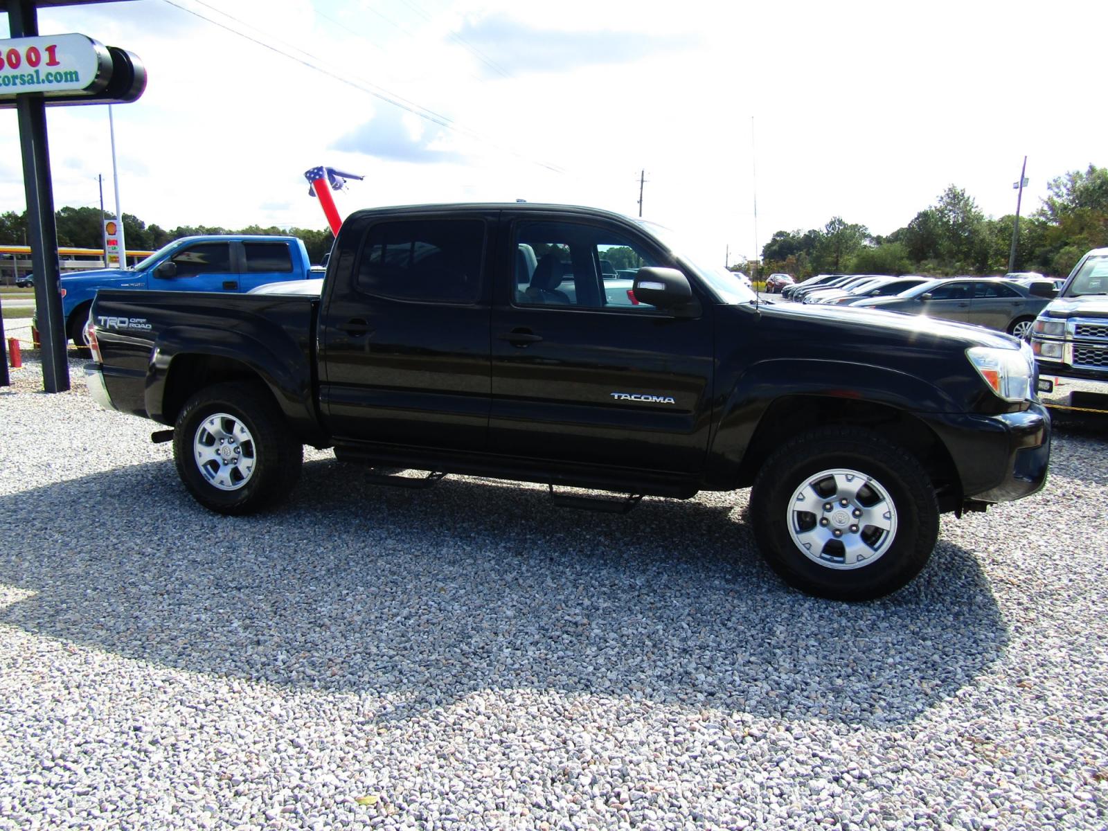 2013 Black /Gray Toyota Tacoma Double Cab V6 4WD (3TMLU4EN0DM) with an 4.0L V6 DOHC 24V engine, Automatic transmission, located at 15016 S Hwy 231, Midland City, AL, 36350, (334) 983-3001, 31.306210, -85.495277 - Photo #0