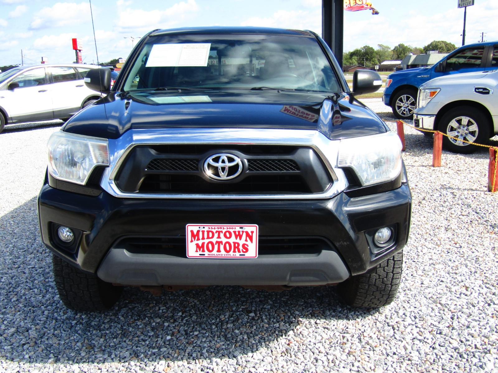 2013 Black /Gray Toyota Tacoma Double Cab V6 4WD (3TMLU4EN0DM) with an 4.0L V6 DOHC 24V engine, Automatic transmission, located at 15016 S Hwy 231, Midland City, AL, 36350, (334) 983-3001, 31.306210, -85.495277 - Photo #1