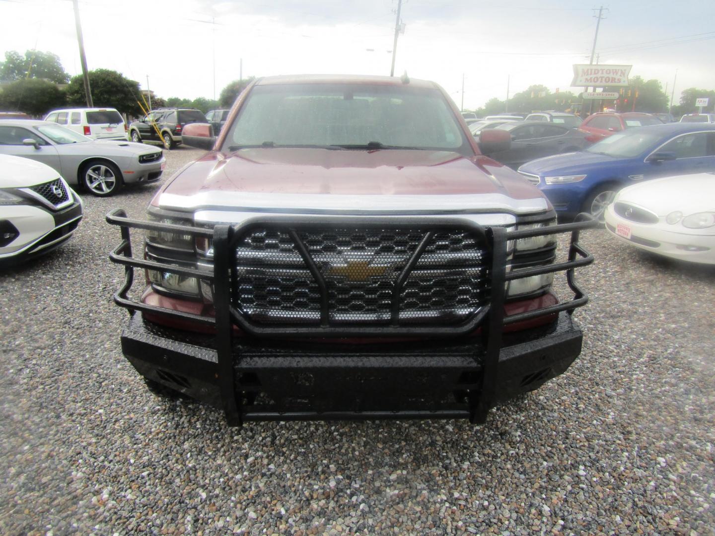 2015 Maroon Chevrolet Silverado 1500 LT Double Cab 4WD (1GCVKREC6FZ) with an 5.3L V8 OHV 16V engine, Automatic transmission, located at 15016 S Hwy 231, Midland City, AL, 36350, (334) 983-3001, 31.306210, -85.495277 - Photo#1