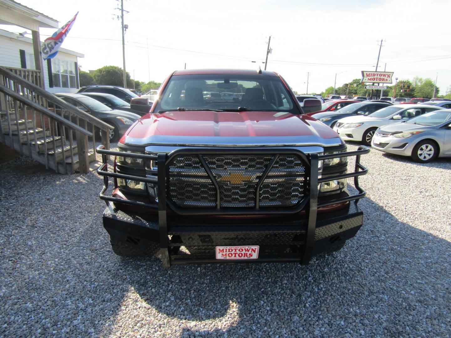 2015 Maroon Chevrolet Silverado 1500 LT Double Cab 4WD (1GCVKREC6FZ) with an 5.3L V8 OHV 16V engine, Automatic transmission, located at 15016 S Hwy 231, Midland City, AL, 36350, (334) 983-3001, 31.306210, -85.495277 - Photo#1