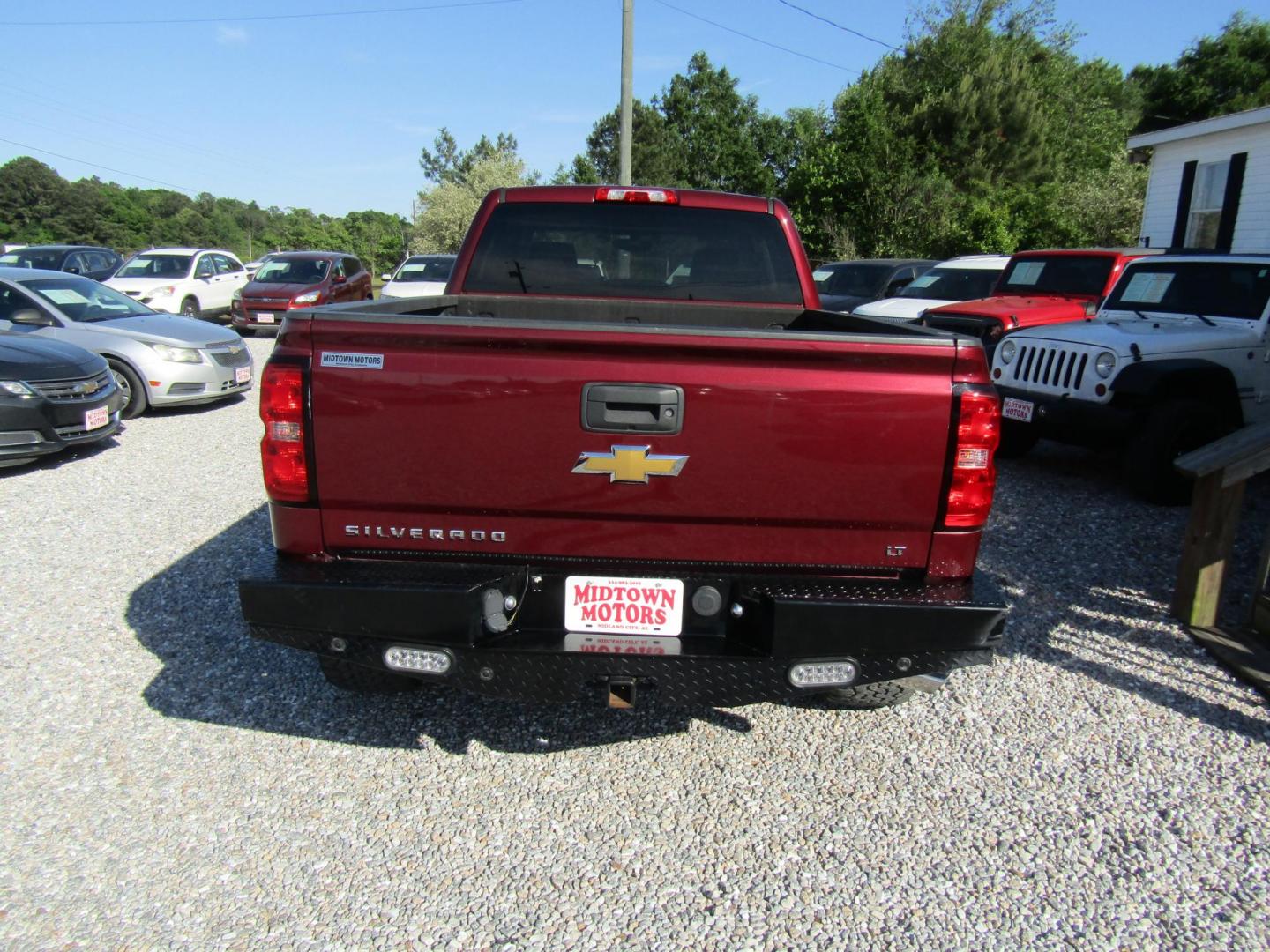 2015 Maroon Chevrolet Silverado 1500 LT Double Cab 4WD (1GCVKREC6FZ) with an 5.3L V8 OHV 16V engine, Automatic transmission, located at 15016 S Hwy 231, Midland City, AL, 36350, (334) 983-3001, 31.306210, -85.495277 - Photo#6