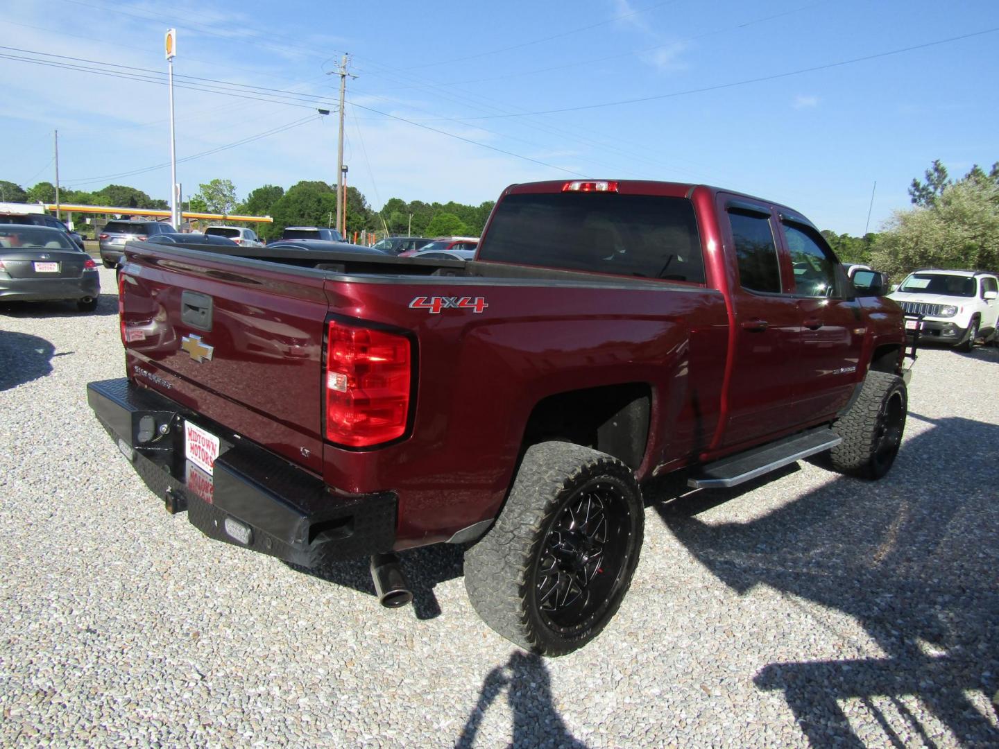 2015 Maroon Chevrolet Silverado 1500 LT Double Cab 4WD (1GCVKREC6FZ) with an 5.3L V8 OHV 16V engine, Automatic transmission, located at 15016 S Hwy 231, Midland City, AL, 36350, (334) 983-3001, 31.306210, -85.495277 - Photo#7
