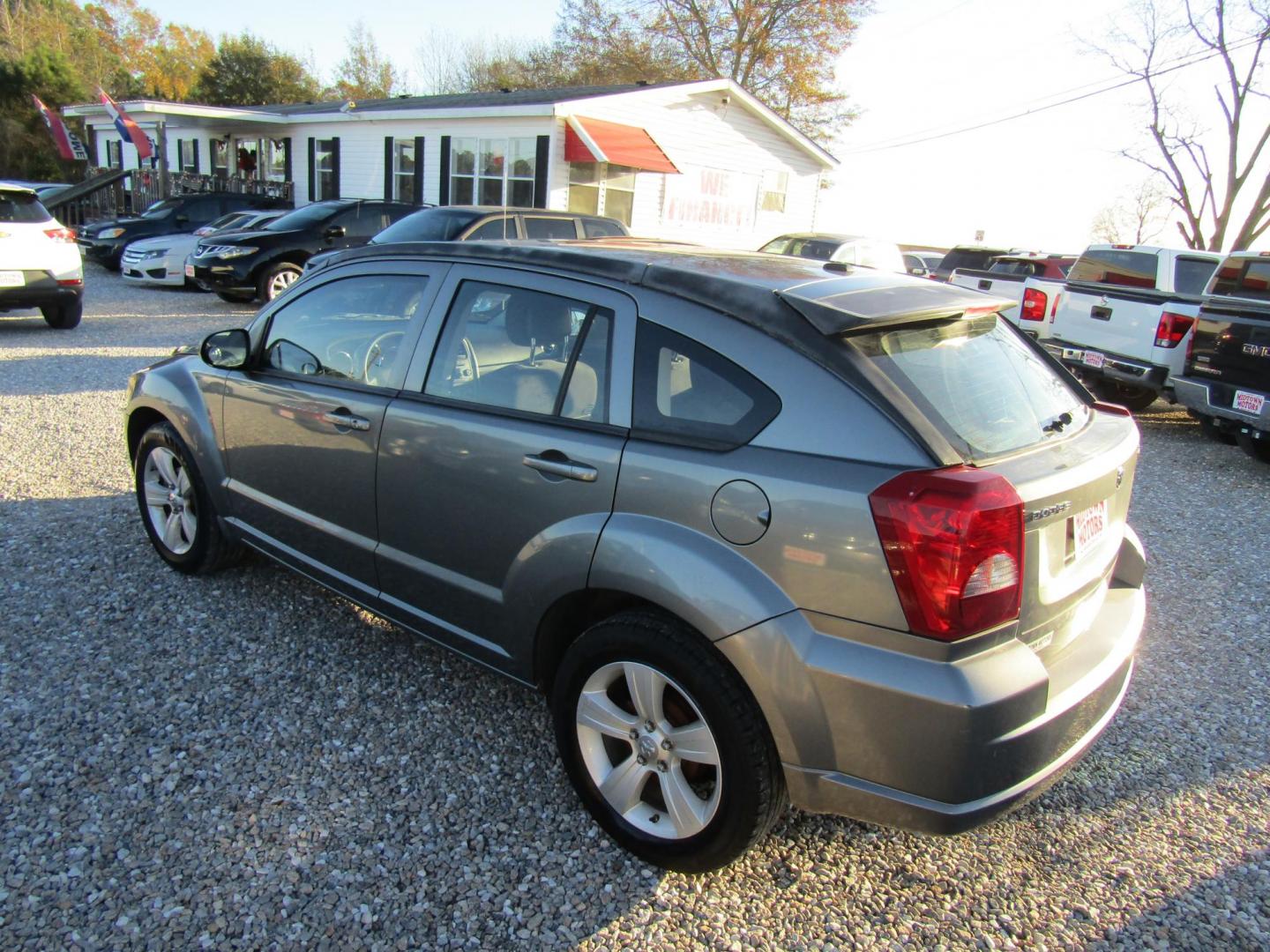 2011 Gray /Gray Dodge Caliber (1B3CB3HA4BD) with an 4 CYL engine, Automatic transmission, located at 15016 S Hwy 231, Midland City, AL, 36350, (334) 983-3001, 31.306210, -85.495277 - Photo#4