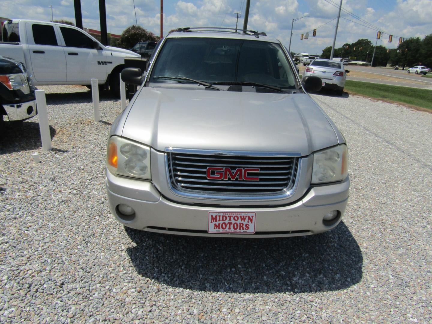 2006 Silver /Gray GMC Envoy SLE 2WD (1GKDS13S162) with an 4.2L L6 DOHC 24V engine, Automatic transmission, located at 15016 S Hwy 231, Midland City, AL, 36350, (334) 983-3001, 31.306210, -85.495277- Photo#1