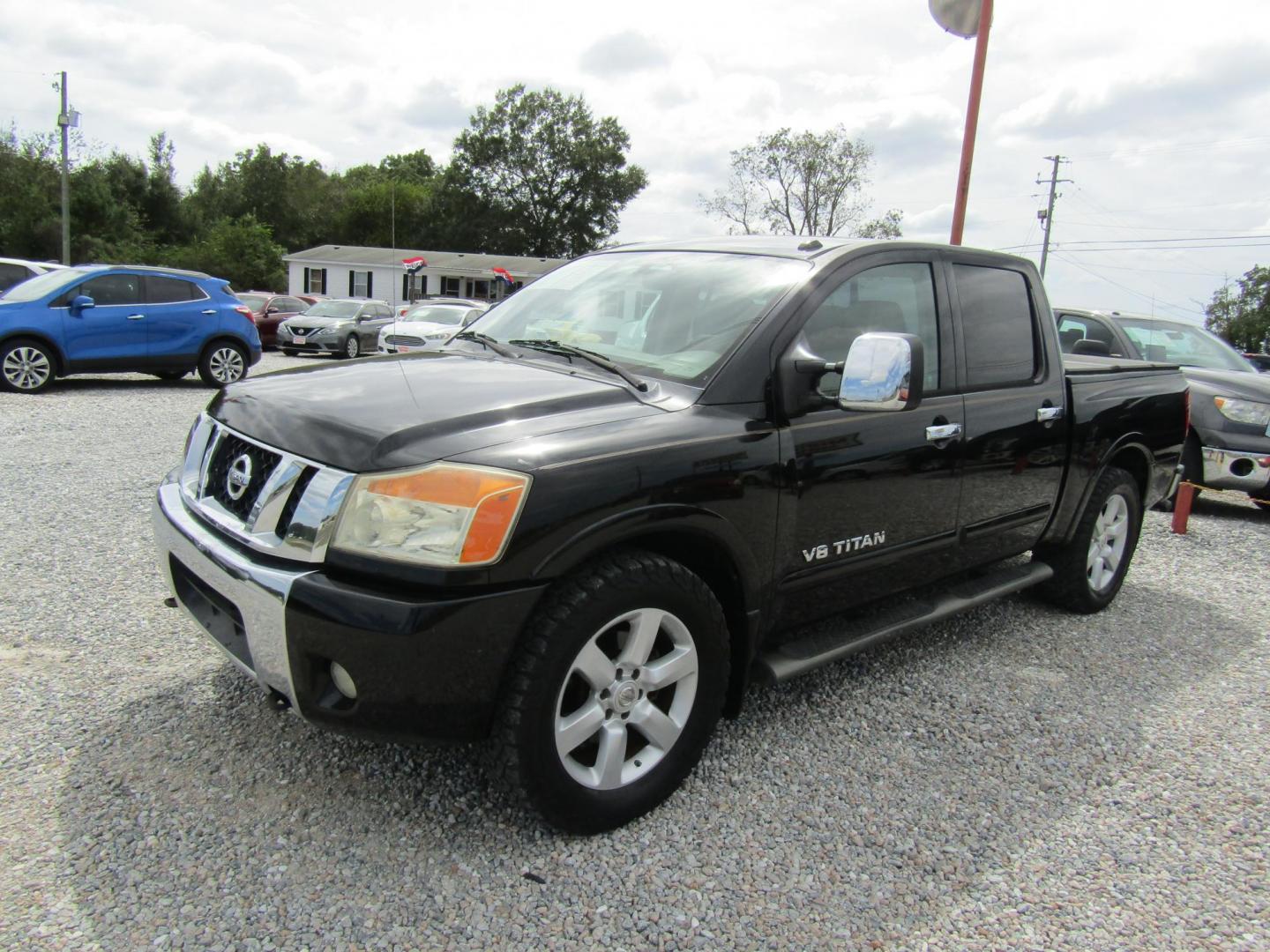 2011 Black /Tan Nissan Titan (1N6BA0ED1BN) with an 8 Cyc engine, Automatic transmission, located at 15016 S Hwy 231, Midland City, AL, 36350, (334) 983-3001, 31.306210, -85.495277 - Photo#3