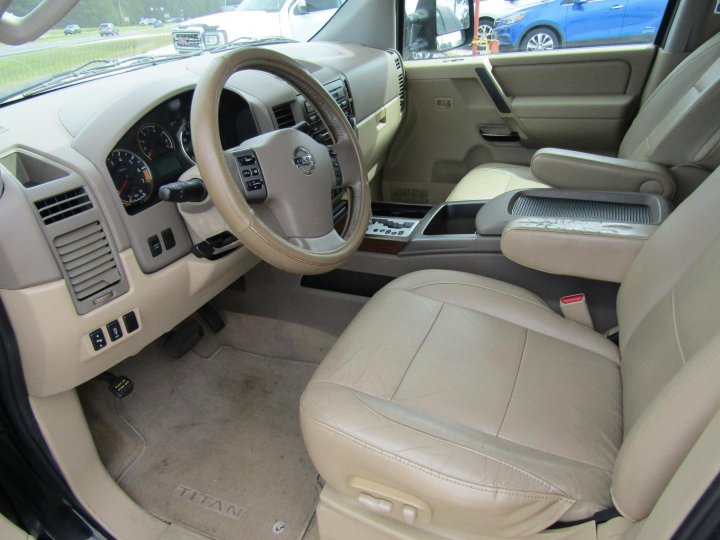 2011 Black /Tan Nissan Titan (1N6BA0ED1BN) with an 8 Cyc engine, Automatic transmission, located at 15016 S Hwy 231, Midland City, AL, 36350, (334) 983-3001, 31.306210, -85.495277 - Photo#4
