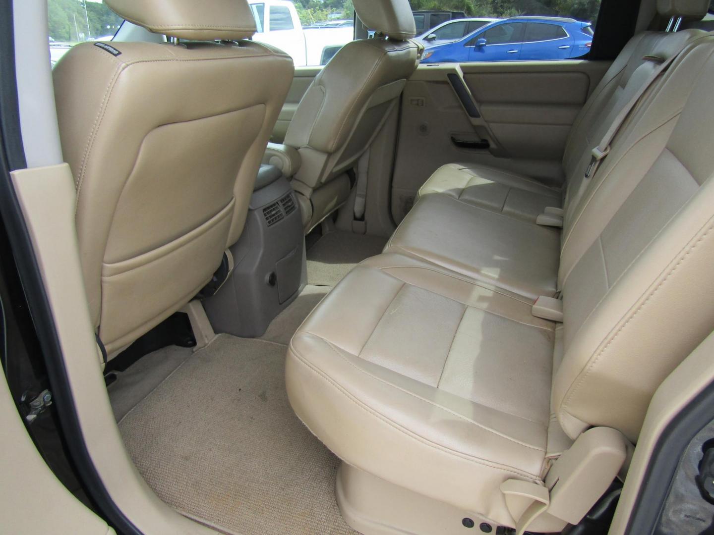 2011 Black /Tan Nissan Titan (1N6BA0ED1BN) with an 8 Cyc engine, Automatic transmission, located at 15016 S Hwy 231, Midland City, AL, 36350, (334) 983-3001, 31.306210, -85.495277 - Photo#5