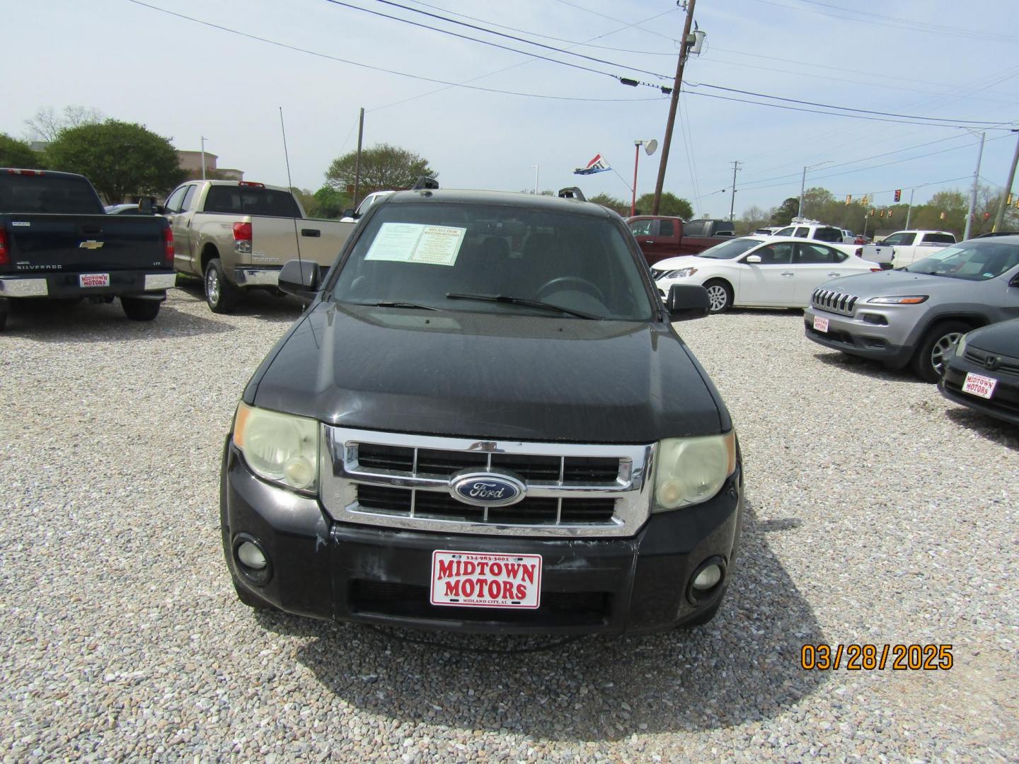 2010 Black Ford Escape Limited FWD (1FMCU0EG8AK) with an 3.0L V6 DOHC 24V engine, Automatic transmission, located at 15016 S Hwy 231, Midland City, AL, 36350, (334) 983-3001, 31.306210, -85.495277 - Photo#1