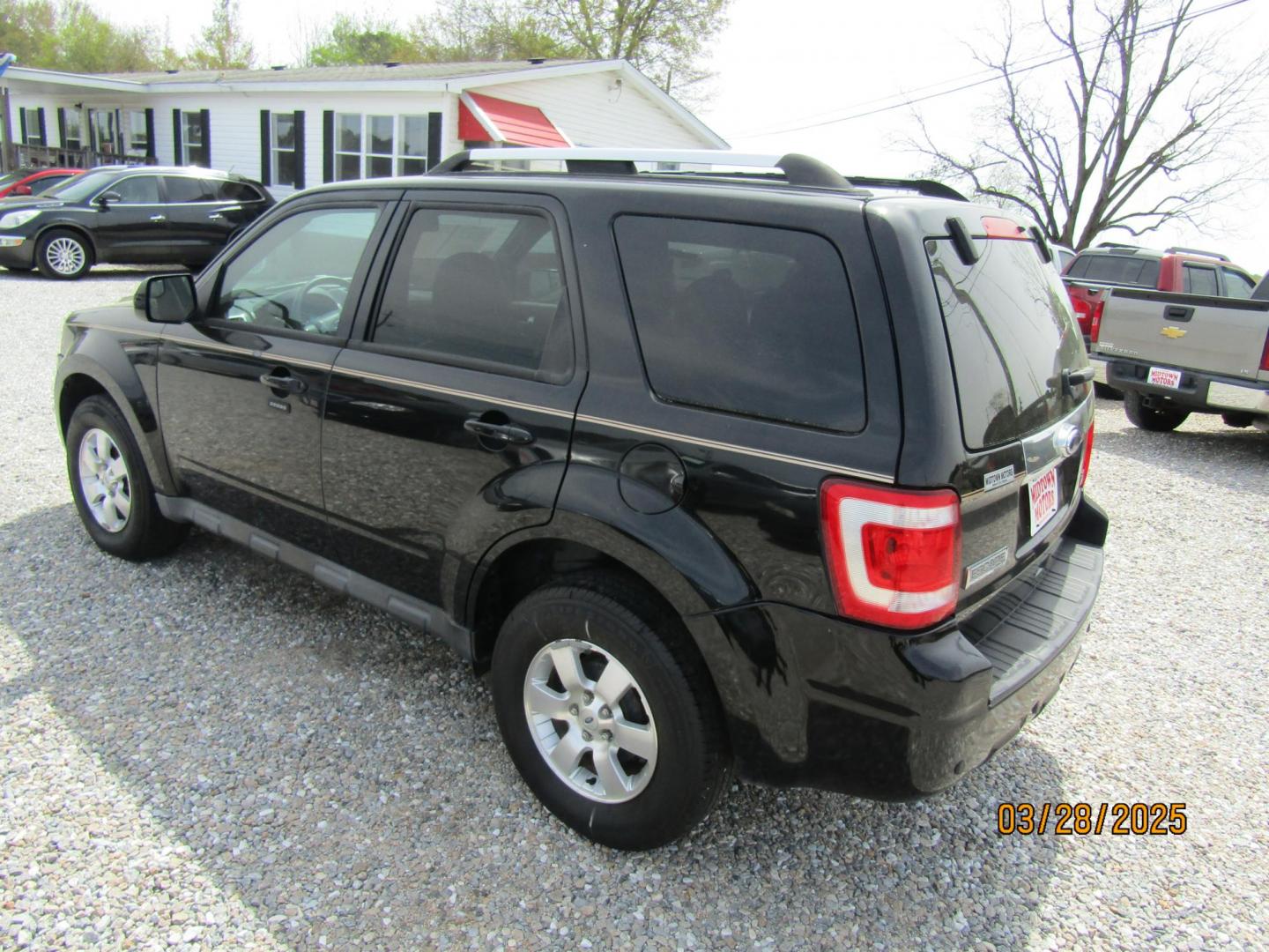 2010 Black Ford Escape Limited FWD (1FMCU0EG8AK) with an 3.0L V6 DOHC 24V engine, Automatic transmission, located at 15016 S Hwy 231, Midland City, AL, 36350, (334) 983-3001, 31.306210, -85.495277 - Photo#5