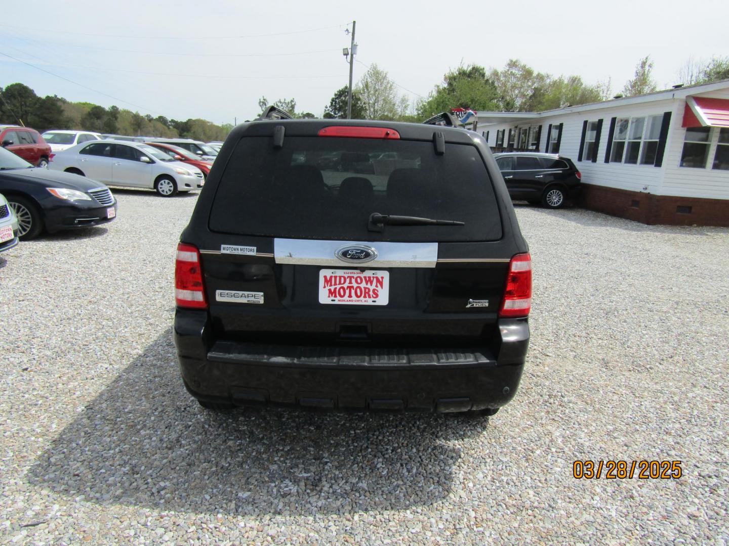 2010 Black Ford Escape Limited FWD (1FMCU0EG8AK) with an 3.0L V6 DOHC 24V engine, Automatic transmission, located at 15016 S Hwy 231, Midland City, AL, 36350, (334) 983-3001, 31.306210, -85.495277 - Photo#6