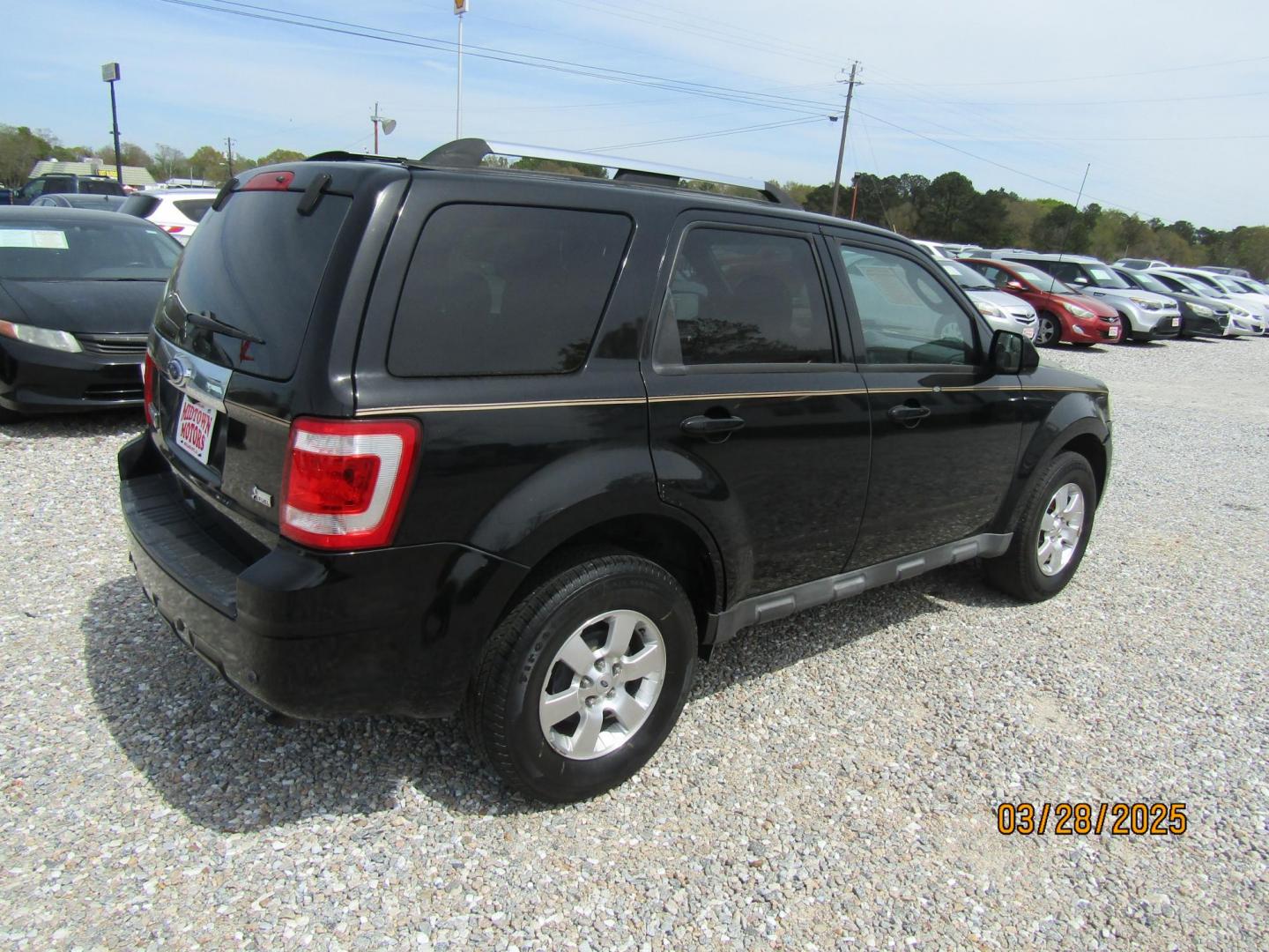 2010 Black Ford Escape Limited FWD (1FMCU0EG8AK) with an 3.0L V6 DOHC 24V engine, Automatic transmission, located at 15016 S Hwy 231, Midland City, AL, 36350, (334) 983-3001, 31.306210, -85.495277 - Photo#7