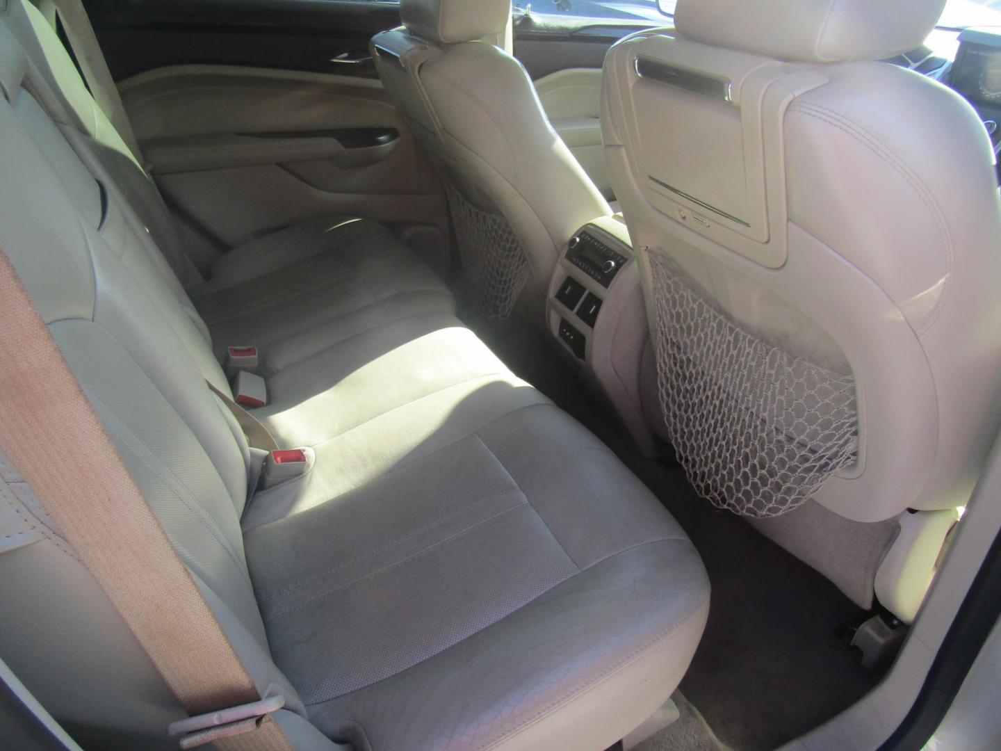 2012 Gold Cadillac SRX Premium (3GYFNCE36CS) with an 3.6L V6 DOHC 24V FFV engine, Automatic transmission, located at 15016 S Hwy 231, Midland City, AL, 36350, (334) 983-3001, 31.306210, -85.495277 - Photo#6