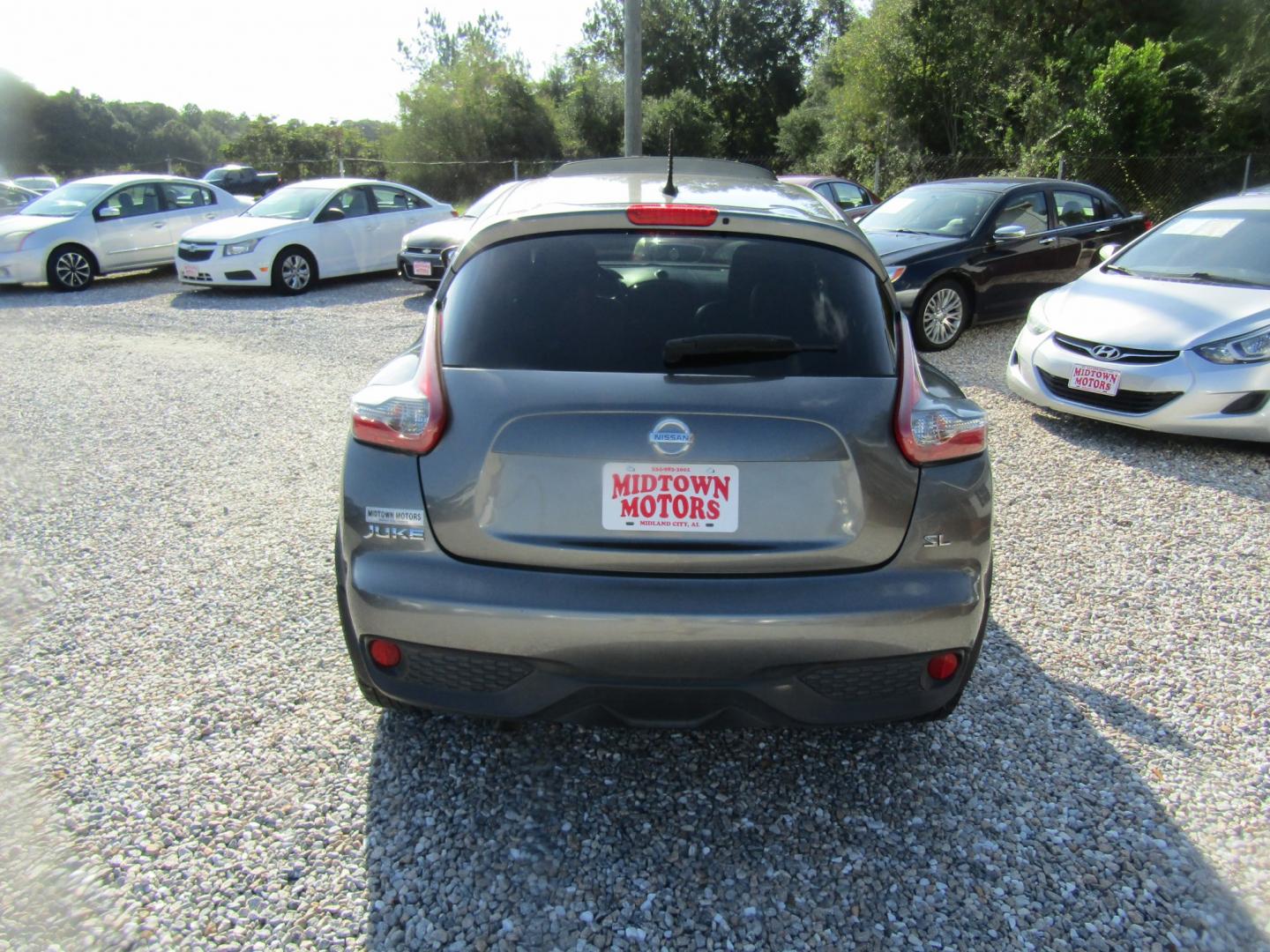 2015 Gray Nissan Juke S FWD (JN8AF5MR4FT) with an 1.6L L4 DOHC 16V engine, Automatic transmission, located at 15016 S Hwy 231, Midland City, AL, 36350, (334) 983-3001, 31.306210, -85.495277- Photo#6