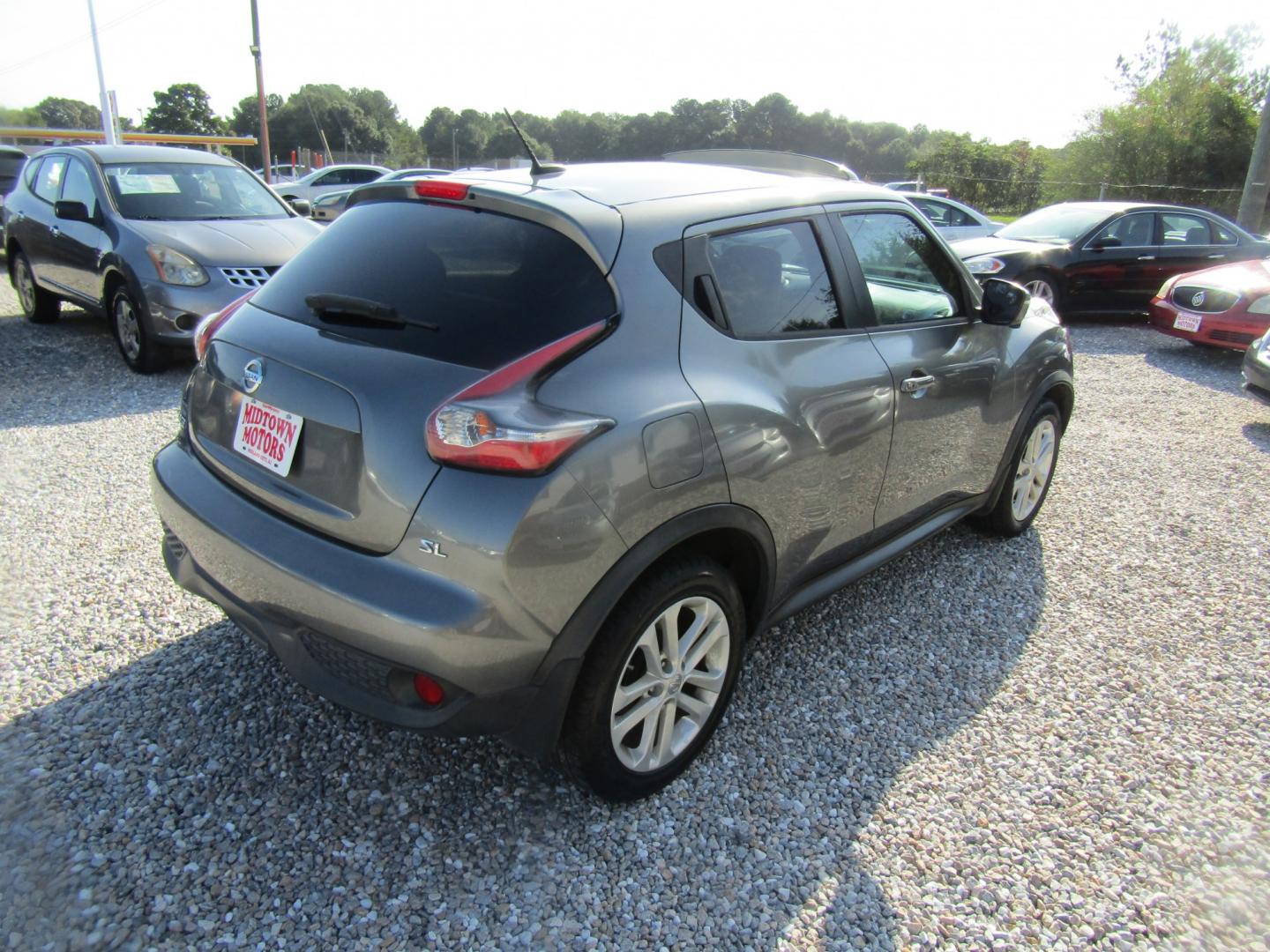 2015 Gray Nissan Juke S FWD (JN8AF5MR4FT) with an 1.6L L4 DOHC 16V engine, Automatic transmission, located at 15016 S Hwy 231, Midland City, AL, 36350, (334) 983-3001, 31.306210, -85.495277- Photo#7