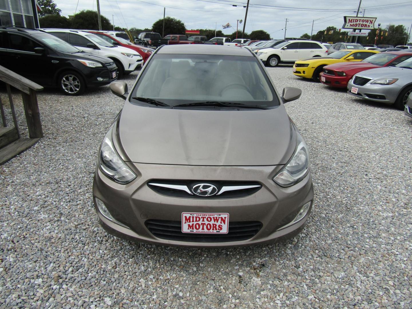 2012 Brown /Tan Hyundai Accent GLS 4-Door (KMHCU4AE1CU) with an 1.6L L4 DOHC 16V engine, Automatic transmission, located at 15016 S Hwy 231, Midland City, AL, 36350, (334) 983-3001, 31.306210, -85.495277 - Photo#1