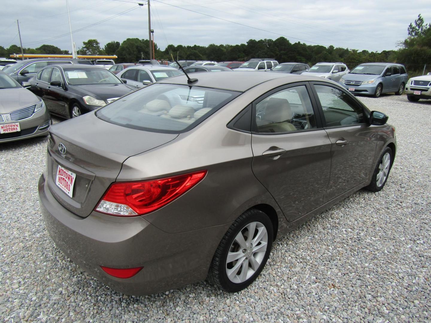 2012 Brown /Tan Hyundai Accent GLS 4-Door (KMHCU4AE1CU) with an 1.6L L4 DOHC 16V engine, Automatic transmission, located at 15016 S Hwy 231, Midland City, AL, 36350, (334) 983-3001, 31.306210, -85.495277 - Photo#5